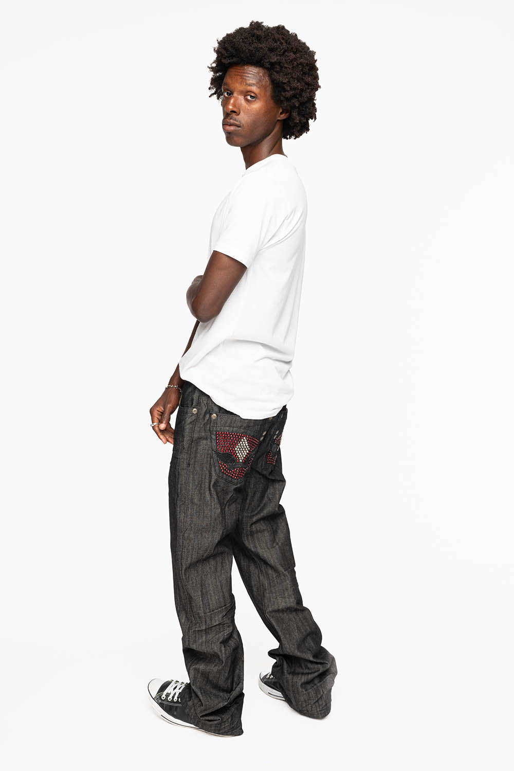 ROBIN’S BOOT CUT JEAN IN RAW BLK DENIM WITH WITH EMBROIDERED WING LOGO ON BACK POCKETS WITH CRYSTALS