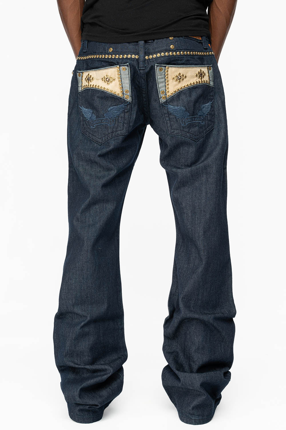 WESTERN BOOT CUT JEAN WITH ULTRA SUEDE INSERT POCKET EMBELLISHED WITH CRYSTALS AND NAILHEAD STUDS IN RINSE WASH