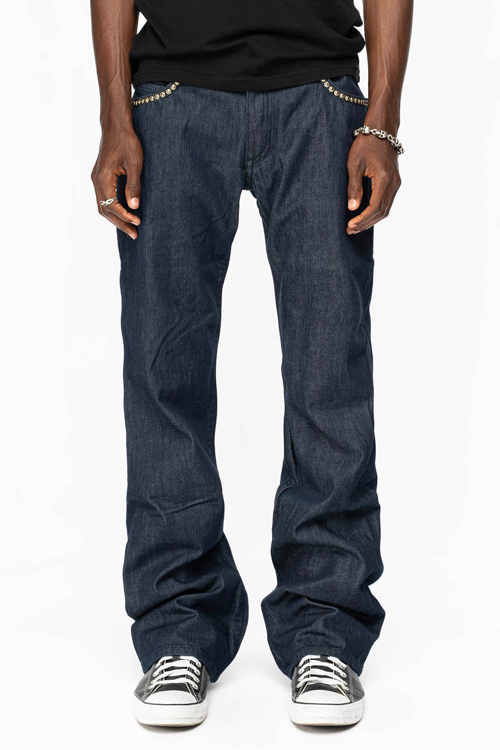 WESTERN BOOT CUT JEAN WITH VEGAN PATENT LEATHER POCKET EMBELLISHED WITH CRYSTALS AND NAILHEAD STUDS IN RINSE WASH