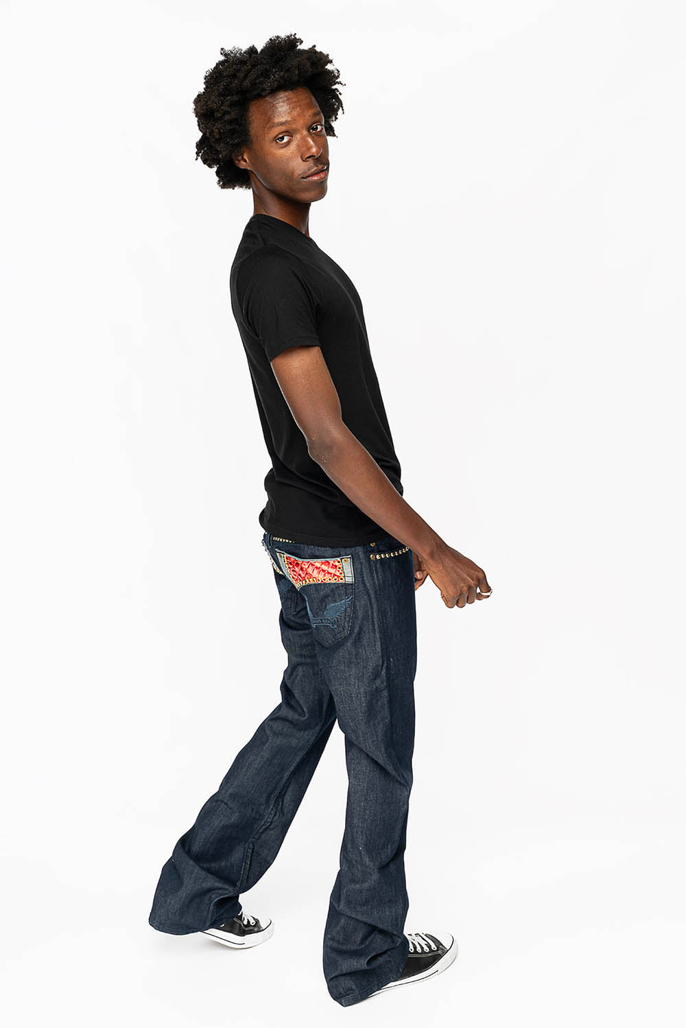 WESTERN BOOT CUT JEAN WITH VEGAN PATENT LEATHER POCKET EMBELLISHED WITH CRYSTALS AND NAILHEAD STUDS IN RINSE WASH