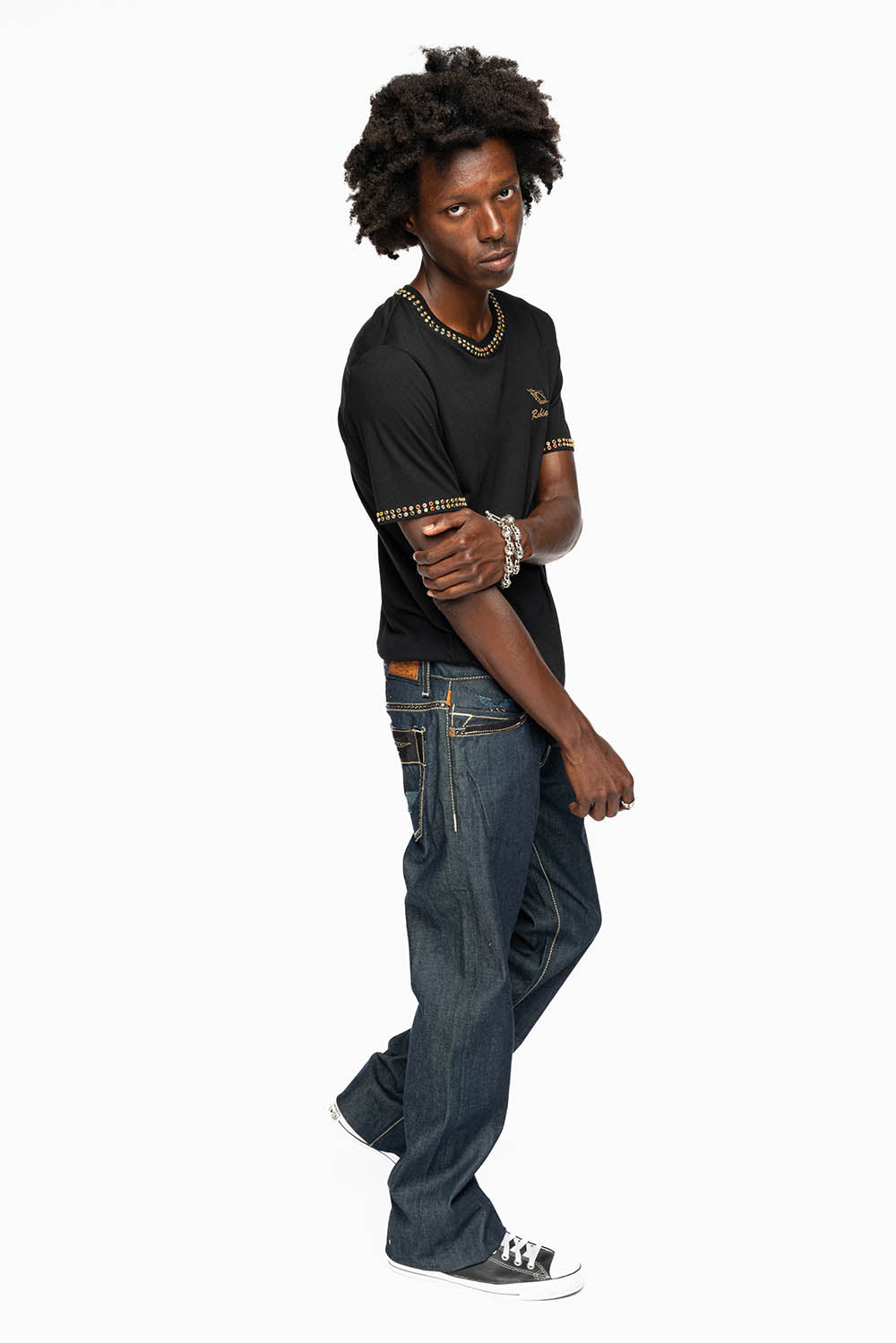 ROBIN’S BOOT CUT STURGIS WESTERN JEAN IN RAW DENIM WITH LEATHER INSERTS EMBELLISHED WITH CRYSTALS