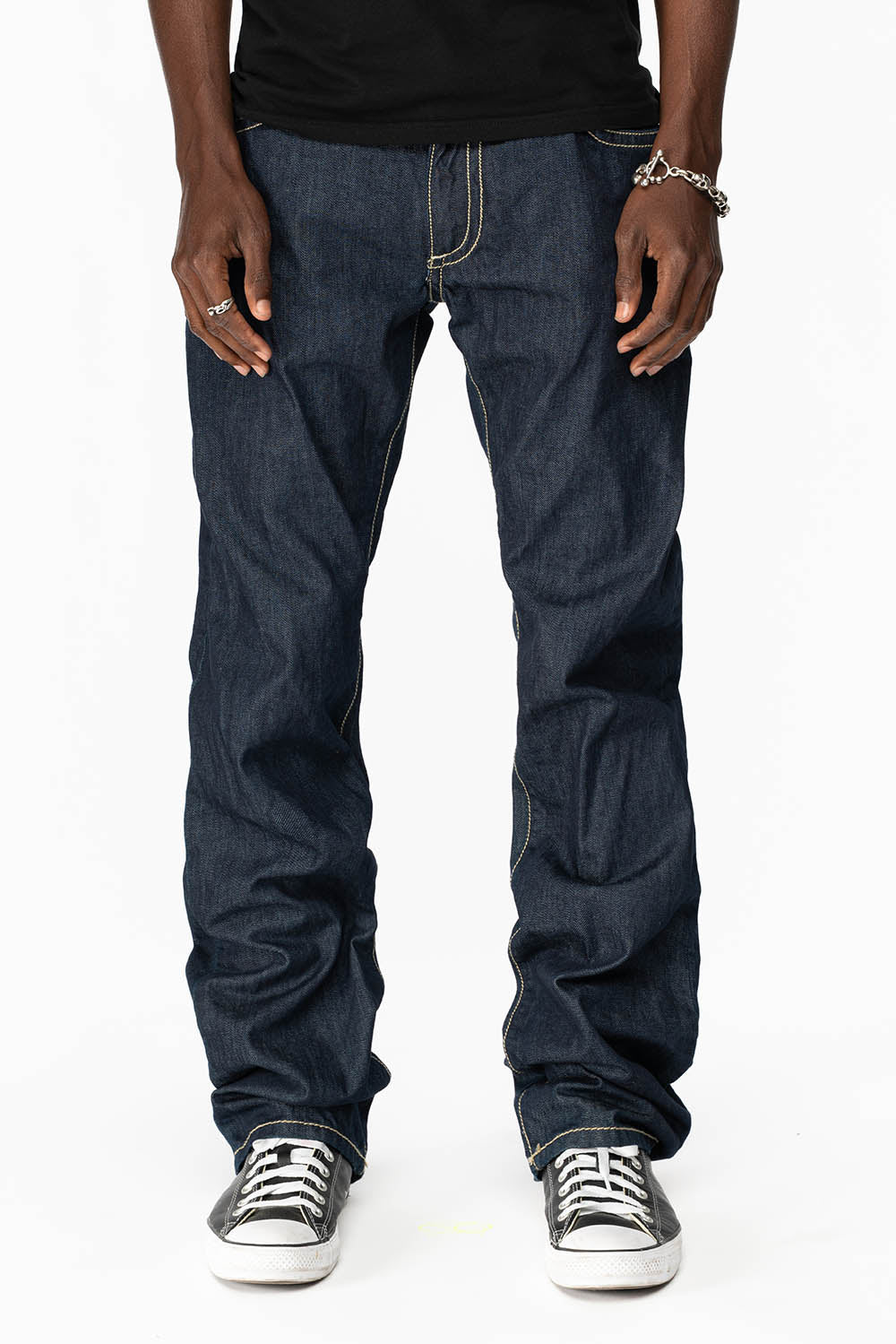 CLINT W/BROWN LEATHER ZIPPER FLAPS IN RINSE WASH WITH ANTIQUE BRASS EMBELLISHMENT