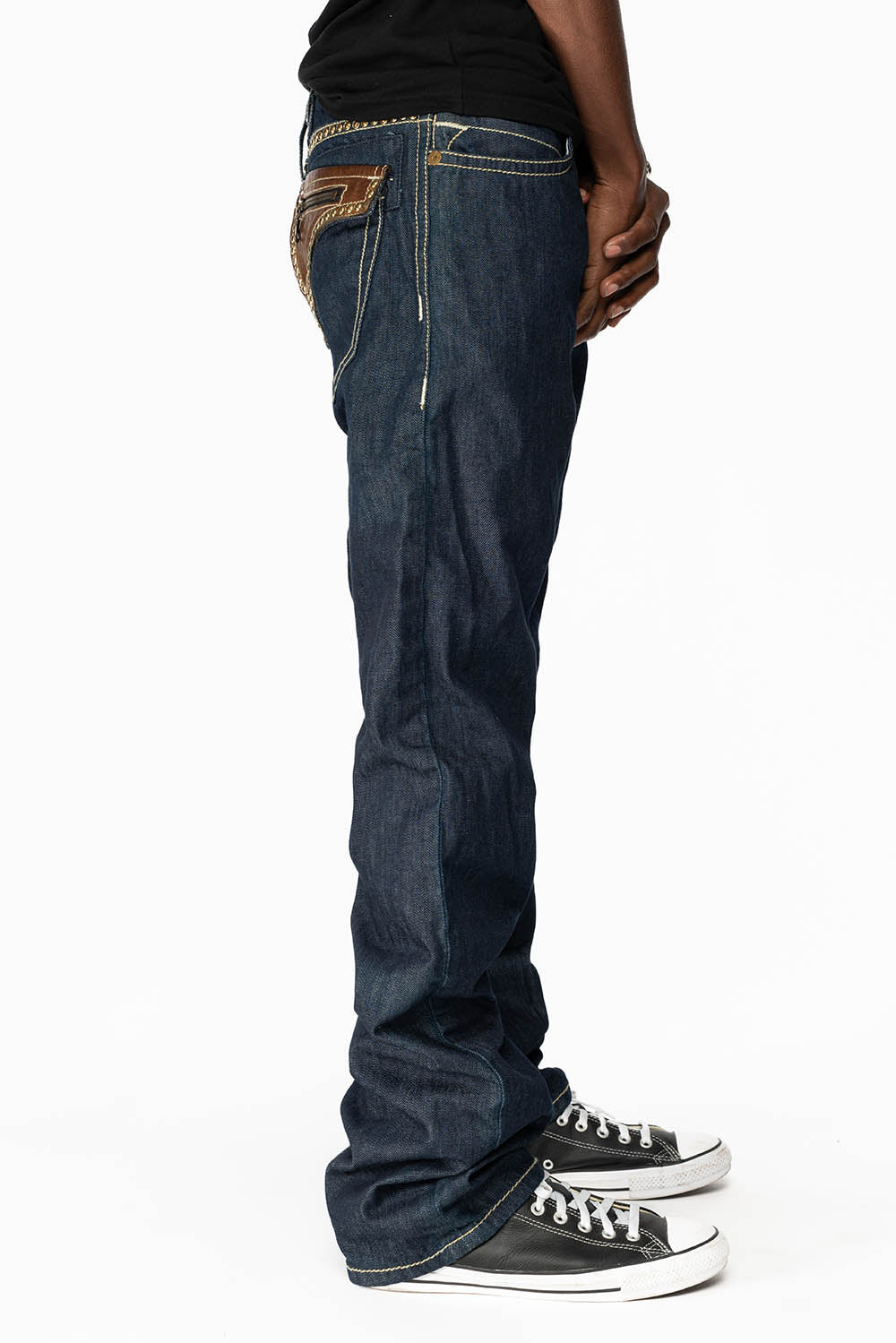 CLINT W/BROWN LEATHER ZIPPER FLAPS IN RINSE WASH WITH ANTIQUE BRASS EMBELLISHMENT