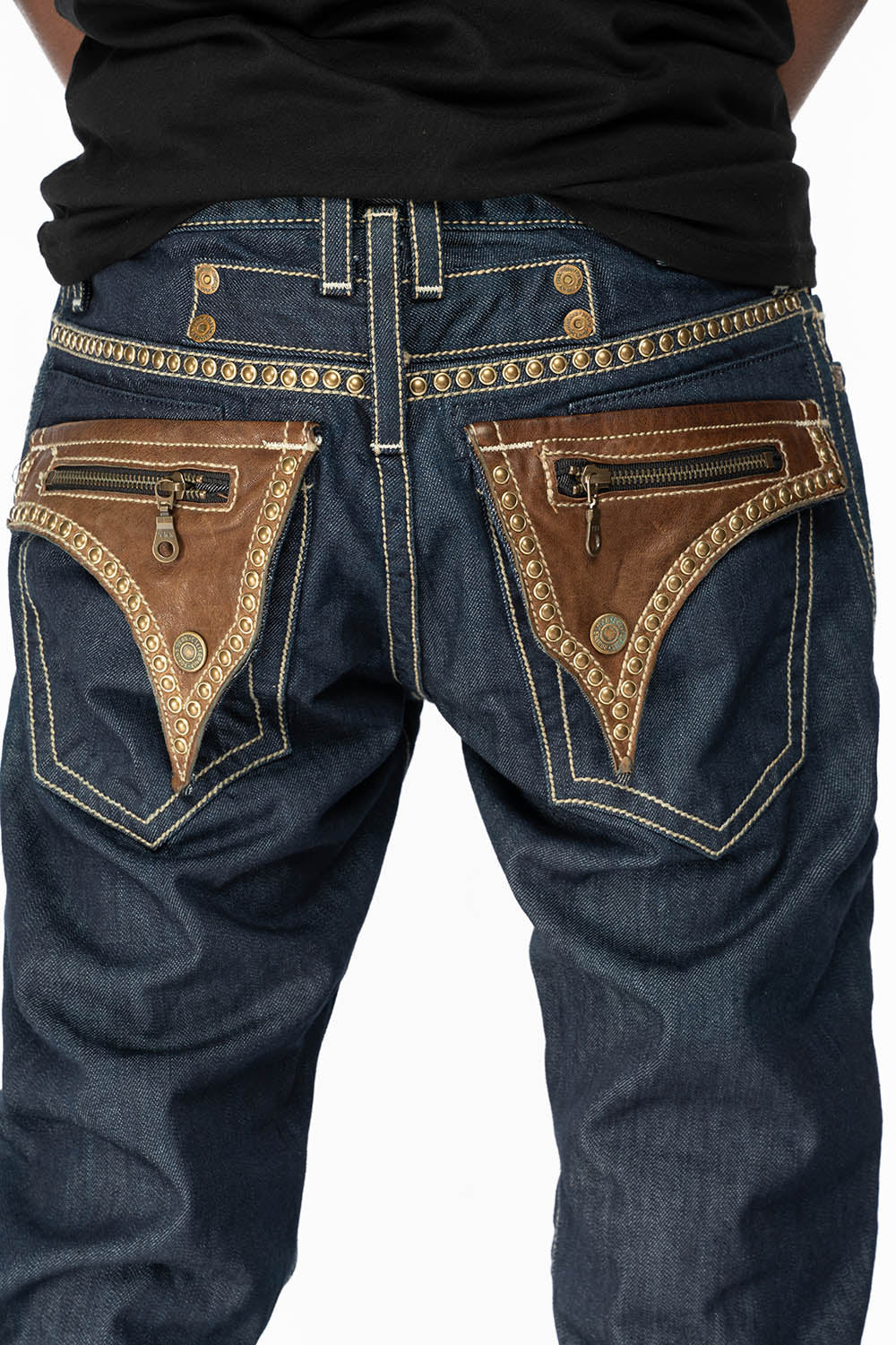 CLINT W/BROWN LEATHER ZIPPER FLAPS IN RINSE WASH WITH ANTIQUE BRASS EMBELLISHMENT
