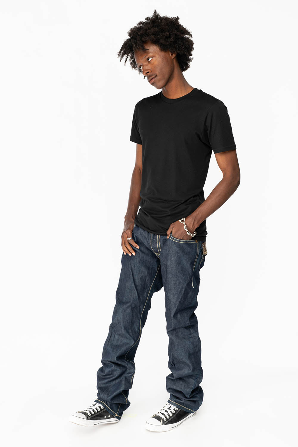 CLINT W/BROWN LEATHER ZIPPER FLAPS IN RINSE WASH WITH ANTIQUE BRASS EMBELLISHMENT