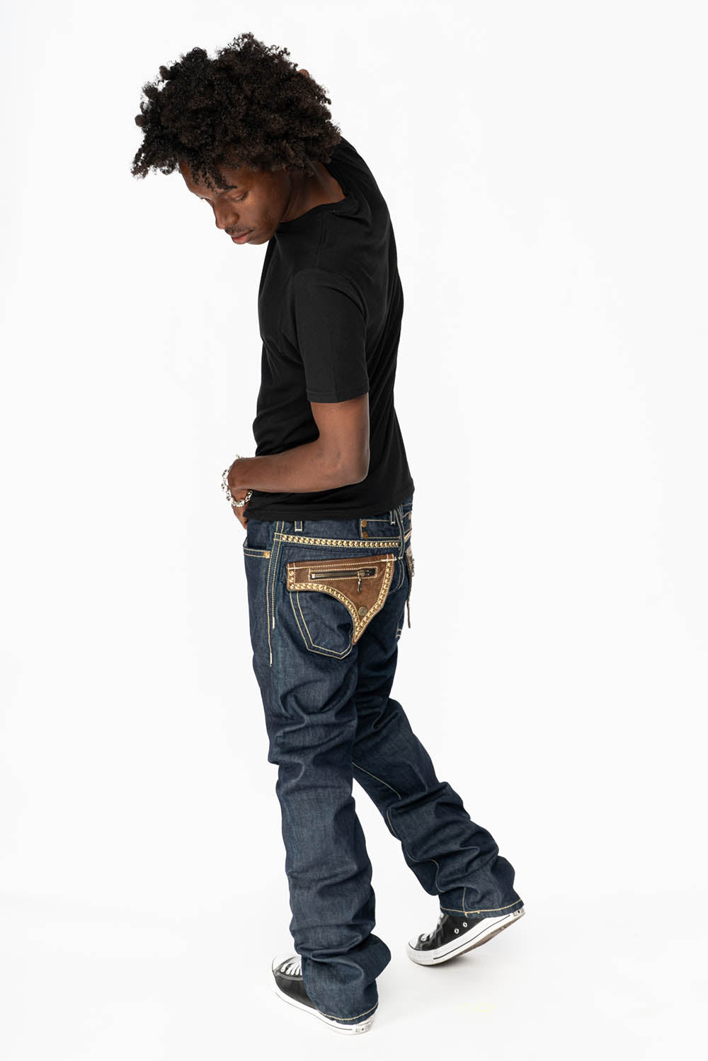 CLINT W/BROWN LEATHER ZIPPER FLAPS IN RINSE WASH WITH ANTIQUE BRASS EMBELLISHMENT