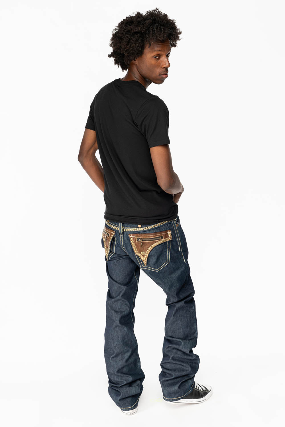 CLINT W/BROWN LEATHER ZIPPER FLAPS IN RINSE WASH WITH ANTIQUE BRASS EMBELLISHMENT
