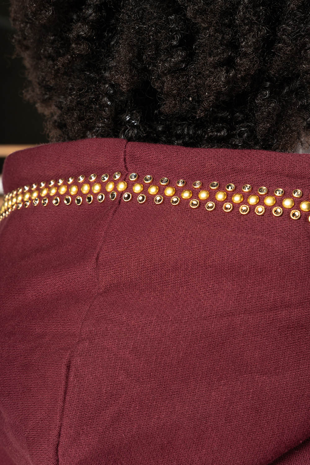 ROBIN’S JEAN PULLOVER HOODIE IN BURGUNDY EMBELLISHED WITH  CRYSTALS  AND NAILHEADS