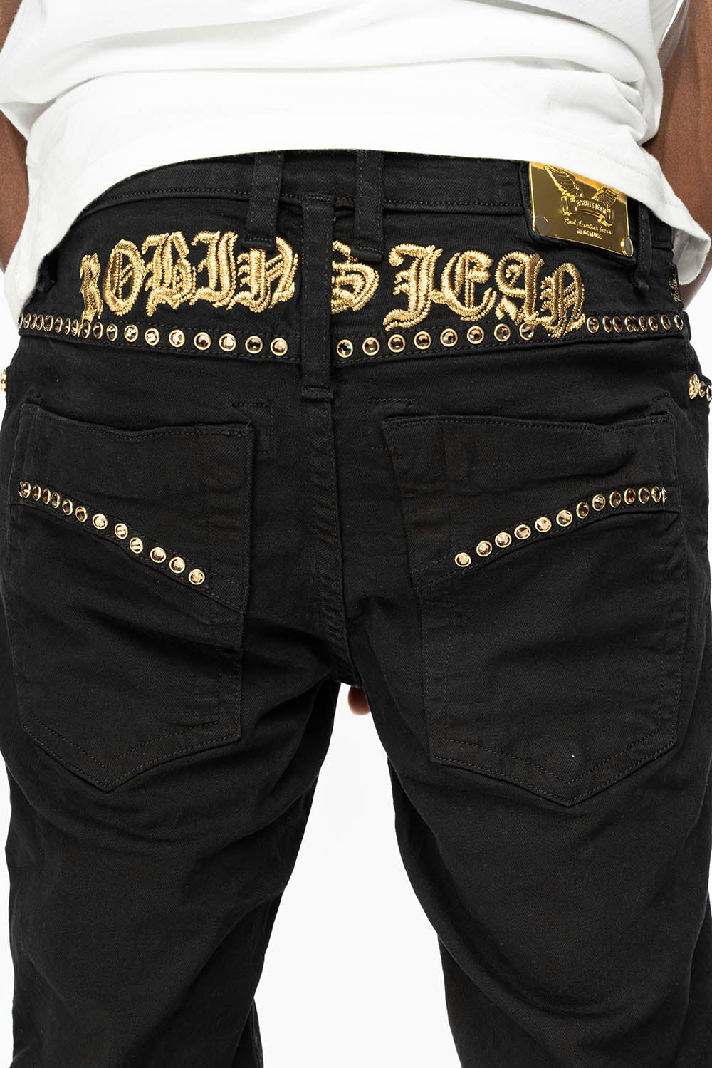 SKINNY JEAN IN PURE BLACK WITH GOLD O.E. LOGO EMBELISHED WITH SMOKY TOPAZ CRYSTALS