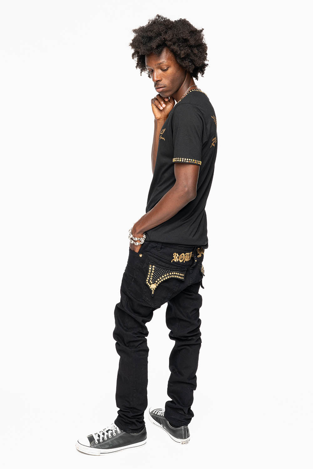 KILLER FLAP SKINNY JEANS FULLY EMBELLISHED WITH AURUM AND BLK CRYSTALS IN PURE BLACK WITH GOLD GOTHIC EMBROIDERY