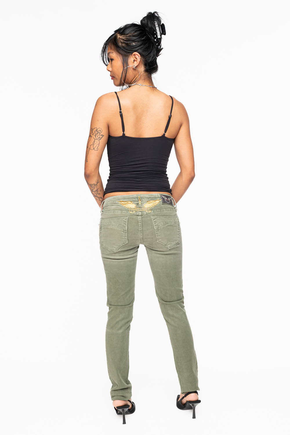 MARILYN WOMENS SKINNY JEANS IN PIGMENT SPRAY GREEN ARMY WITH GOLD WINGS EMBELLISHED WITH CRYSTALS & STUDS