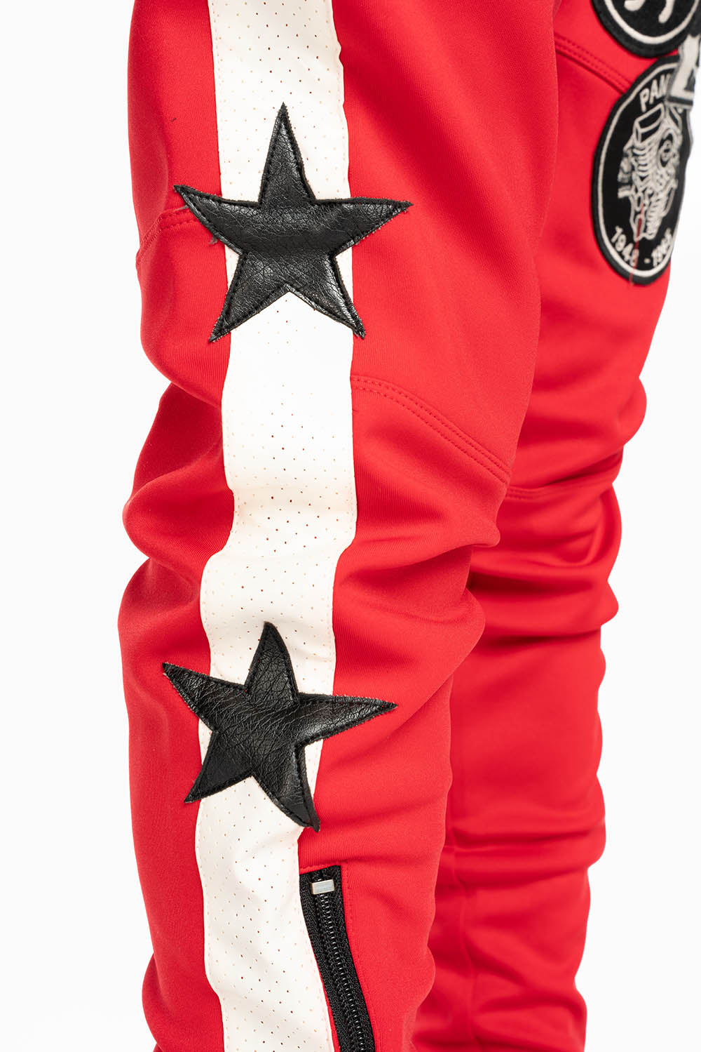RED JOGGER WITH WHITE STRIPE AND PATCHWORK