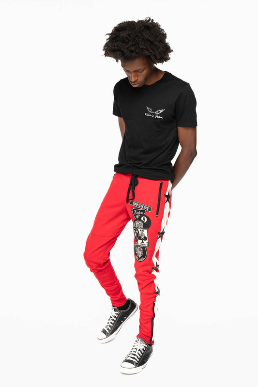 RED JOGGER WITH WHITE STRIPE AND PATCHWORK