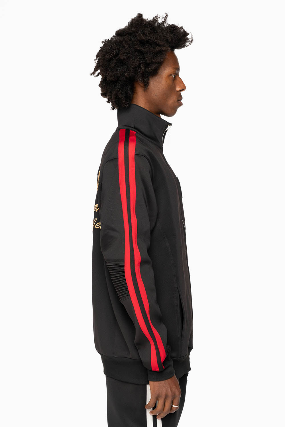 TRACK JACKET IN BLACK WITH RED STRIPE AND GOLD ROBIN’S LOGO EMBROIDERY