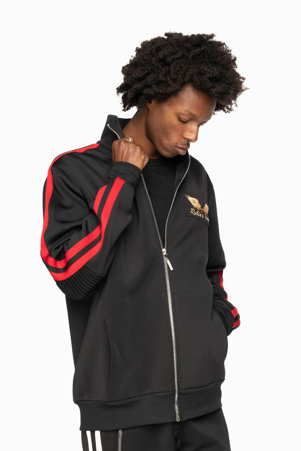 TRACK JACKET IN BLACK WITH RED STRIPE AND GOLD ROBIN’S LOGO EMBROIDERY