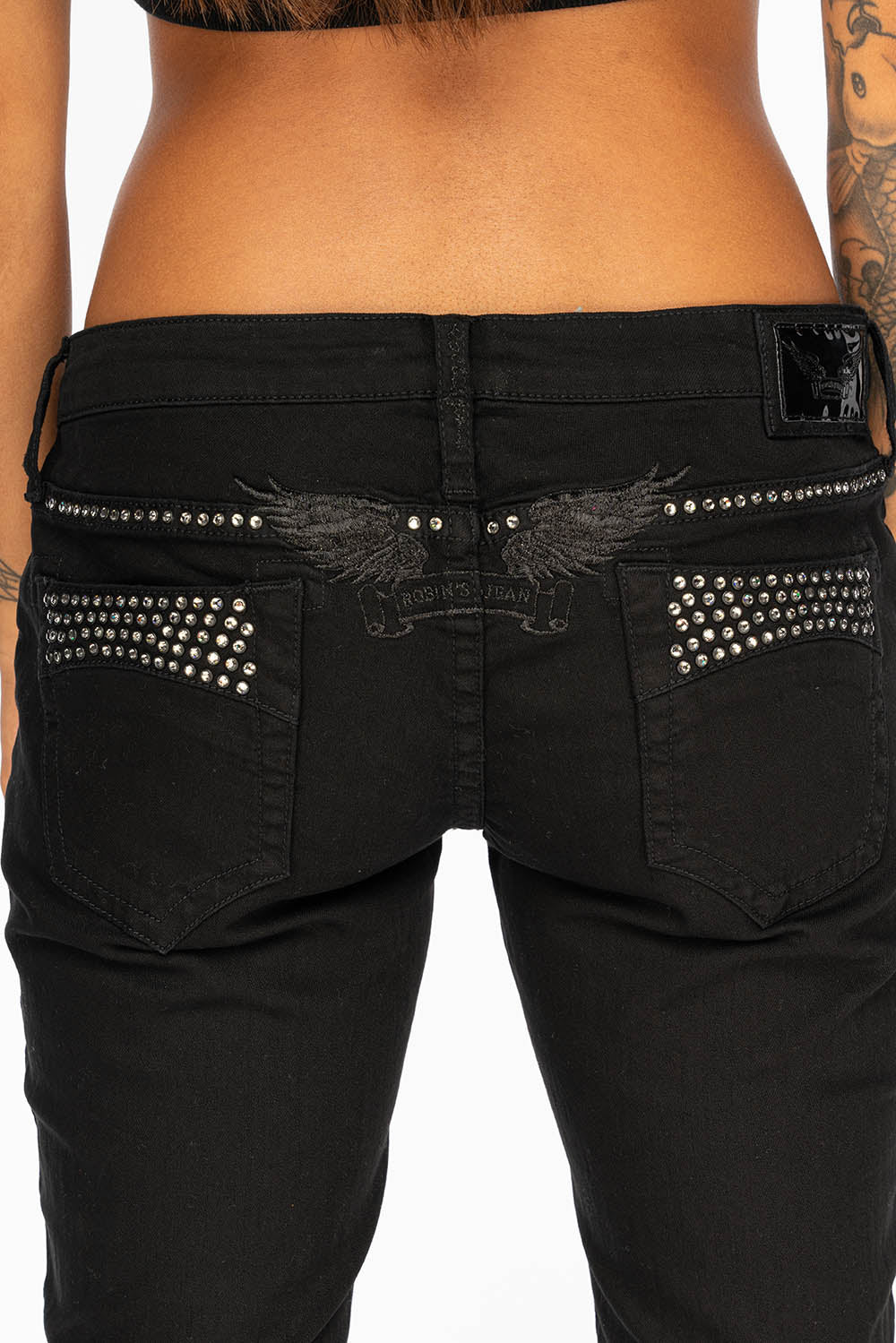 MARILYN WOMENS DISTRESSED & REPAIRED STUDDED SKINNY JEANS IN BLACK WITH BLACK WINGS AND CLEAR CRYSTALS