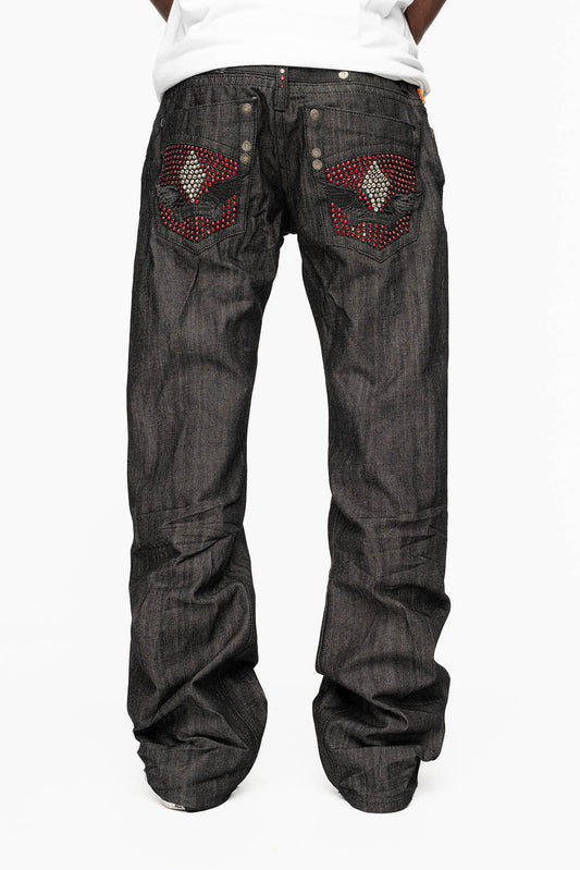 ROBIN’S BOOT CUT JEAN IN RAW BLK DENIM WITH WITH EMBROIDERED WING LOGO ON BACK POCKETS WITH CRYSTALS