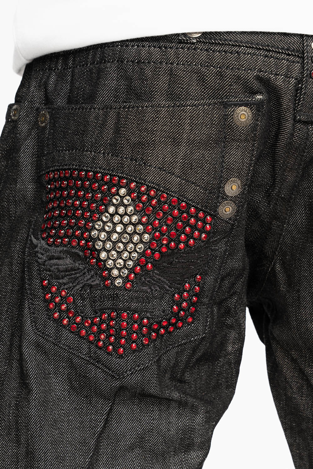 ROBIN’S BOOT CUT JEAN IN RAW BLK DENIM WITH WITH EMBROIDERED WING LOGO ON BACK POCKETS WITH CRYSTALS