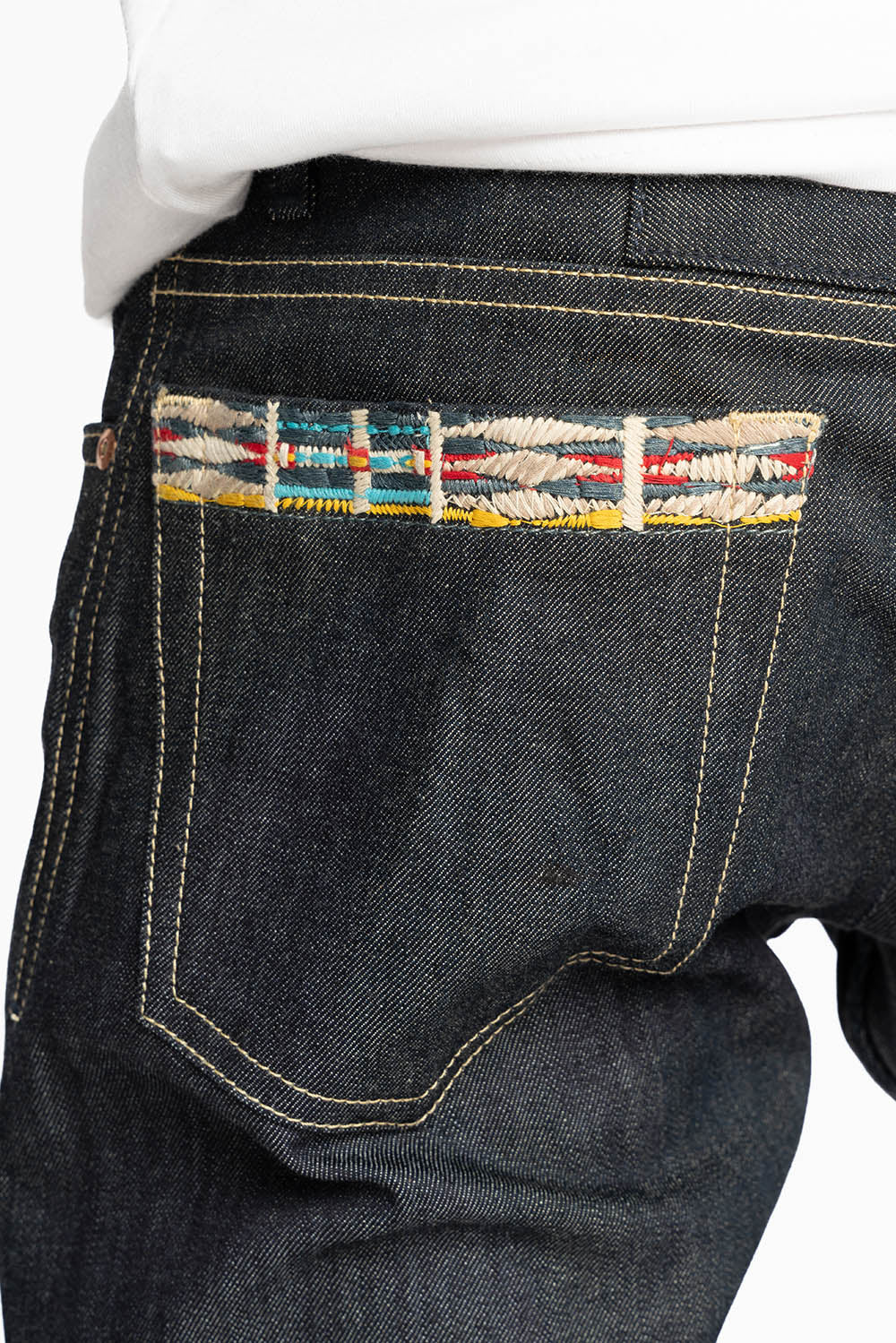 ROBIN’S INDIAN BONE STRIPE SLIM JEANS IN RAW DENIM EMBROIDERED INDIAN TRIBE MOTIF