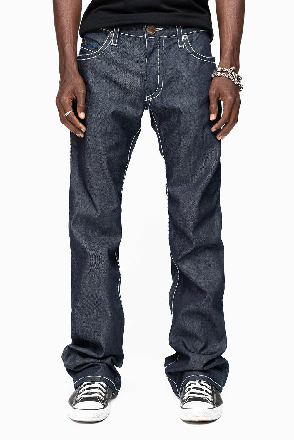 ROBIN’S BOOT CUT JEAN  IN RAW DENIM WITH HEAVY WHITE STITCHING WITH EMBROIDERED WING LOGO ON BACK POCKETS