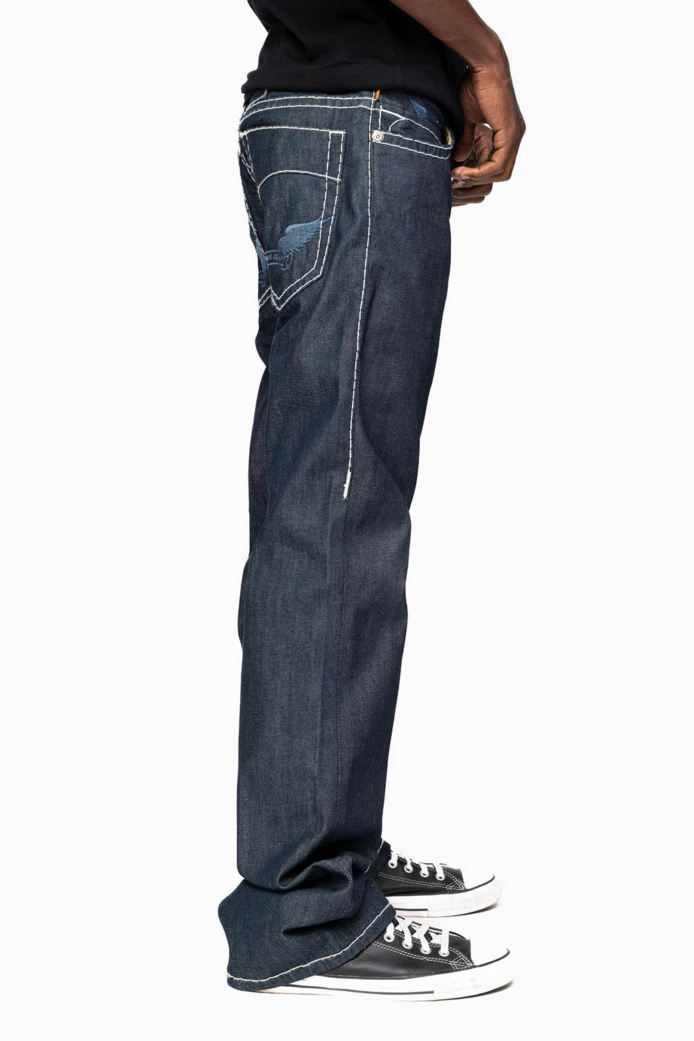 ROBIN’S BOOT CUT JEAN  IN RAW DENIM WITH HEAVY WHITE STITCHING WITH EMBROIDERED WING LOGO ON BACK POCKETS