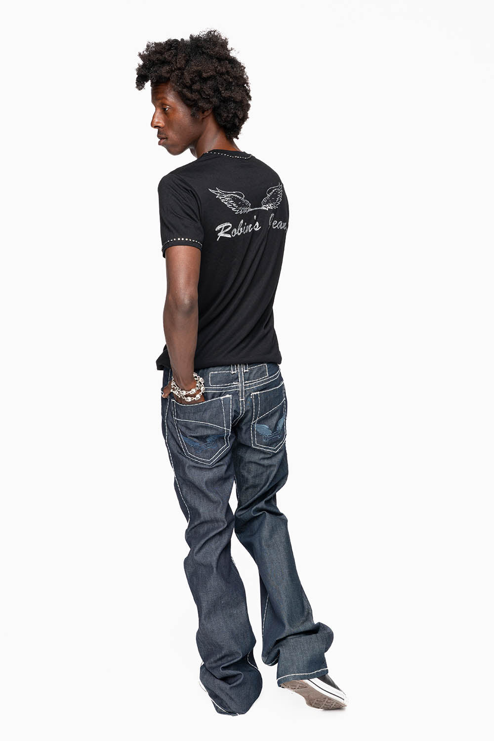 ROBIN’S BOOT CUT JEAN  IN RAW DENIM WITH HEAVY WHITE STITCHING WITH EMBROIDERED WING LOGO ON BACK POCKETS