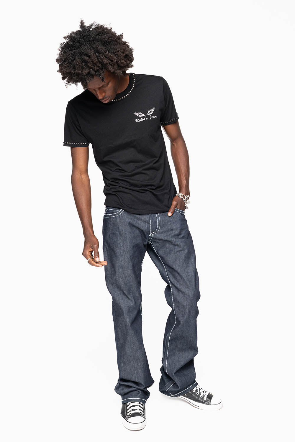ROBIN’S BOOT CUT JEAN  IN RAW DENIM WITH HEAVY WHITE STITCHING WITH EMBROIDERED WING LOGO ON BACK POCKETS