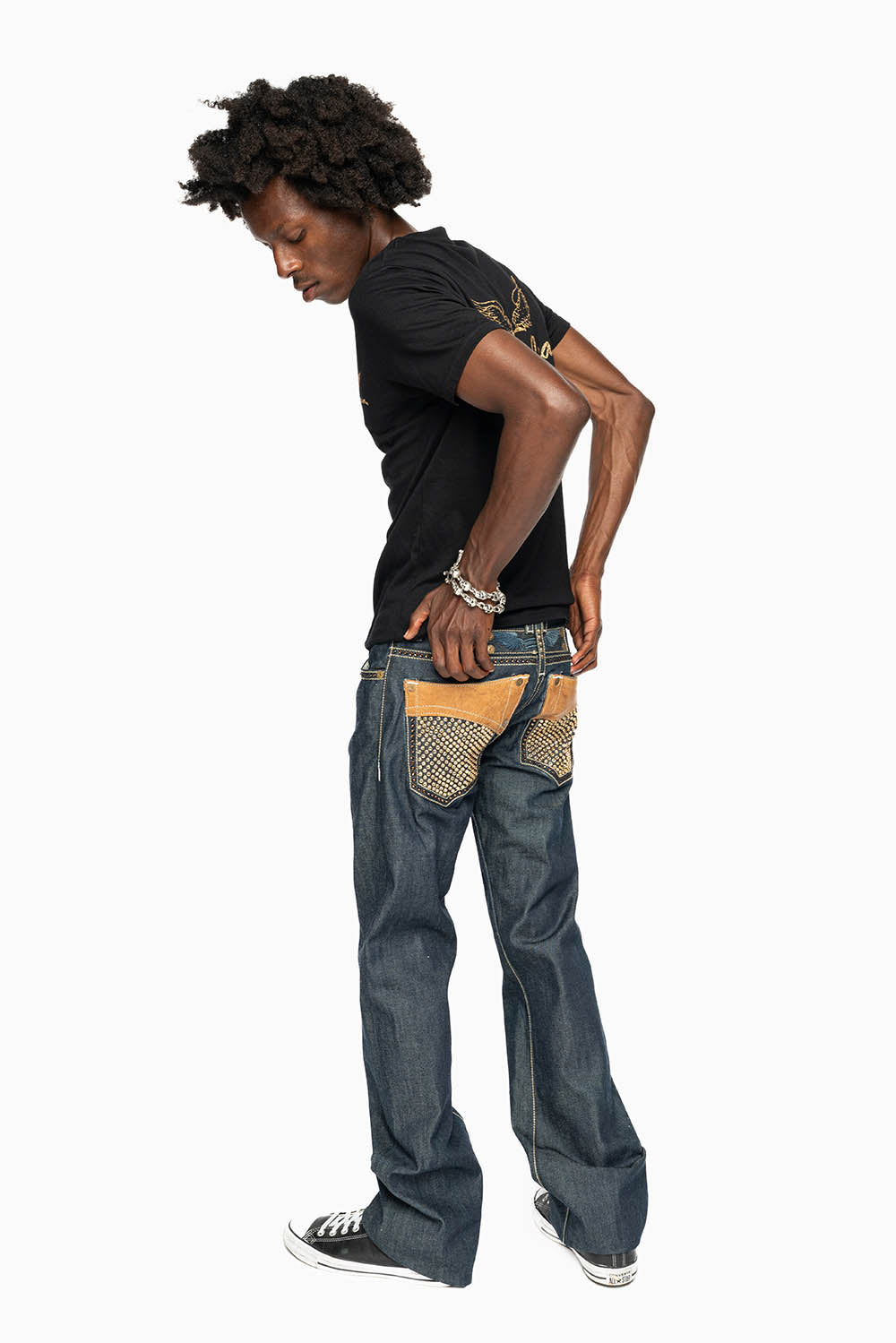 ROBIN’S BOOT CUT WESTERN JEAN  IN RAW DENIM WITH COGNAC LEATHER INSERTS EMBELLISHED WITH CRYSTALS