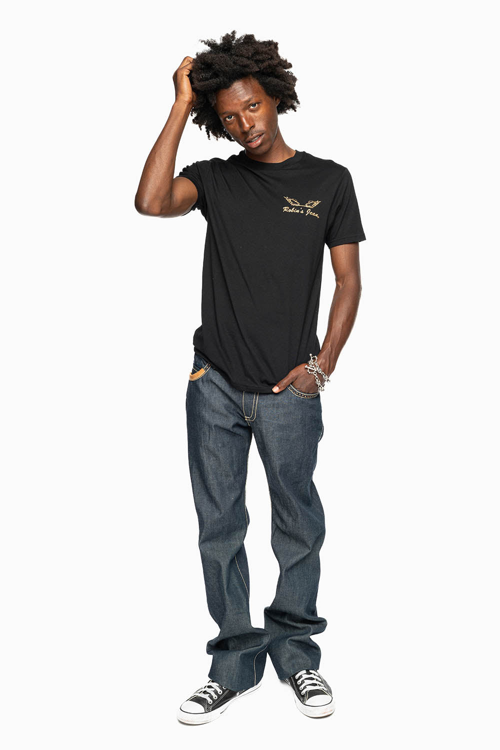 ROBIN’S BOOT CUT WESTERN JEAN  IN RAW DENIM WITH COGNAC LEATHER INSERTS EMBELLISHED WITH CRYSTALS