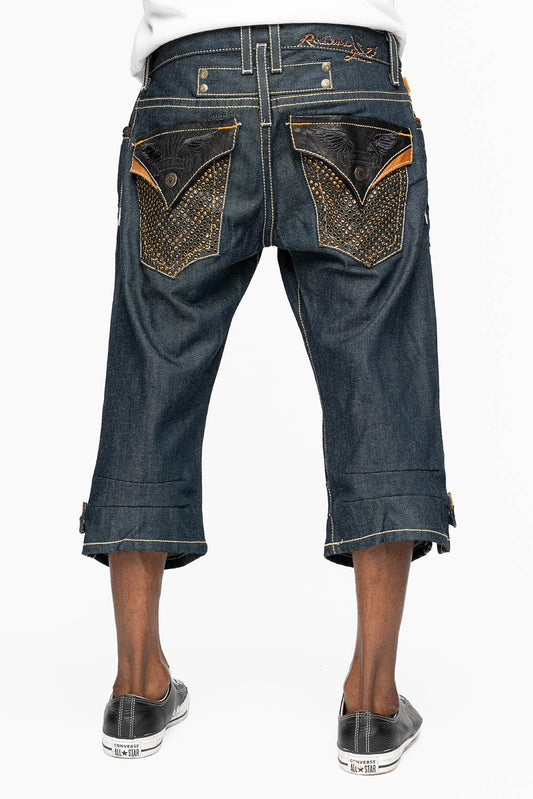ROBIN’S RYDER SHORT IN BLUE RAW DENIM WITH LEATHER FLAPS AND CRYSTALS