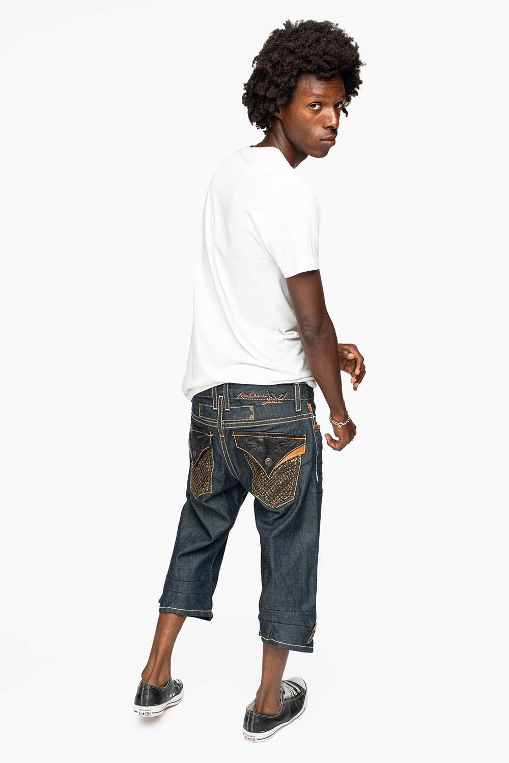 ROBIN’S RYDER SHORT IN BLUE RAW DENIM WITH LEATHER FLAPS AND CRYSTALS