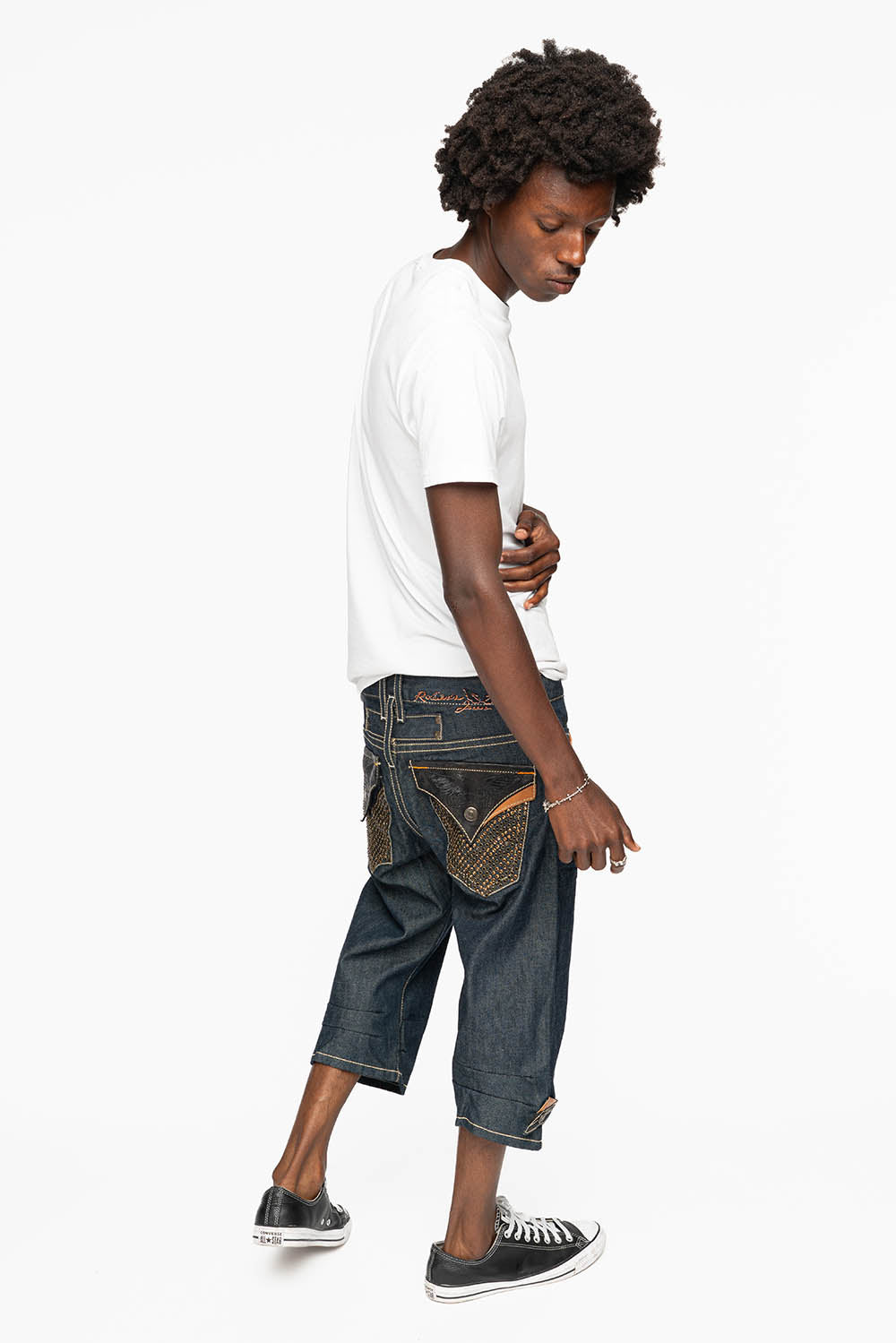 ROBIN’S RYDER SHORT IN BLUE RAW DENIM WITH LEATHER FLAPS AND CRYSTALS