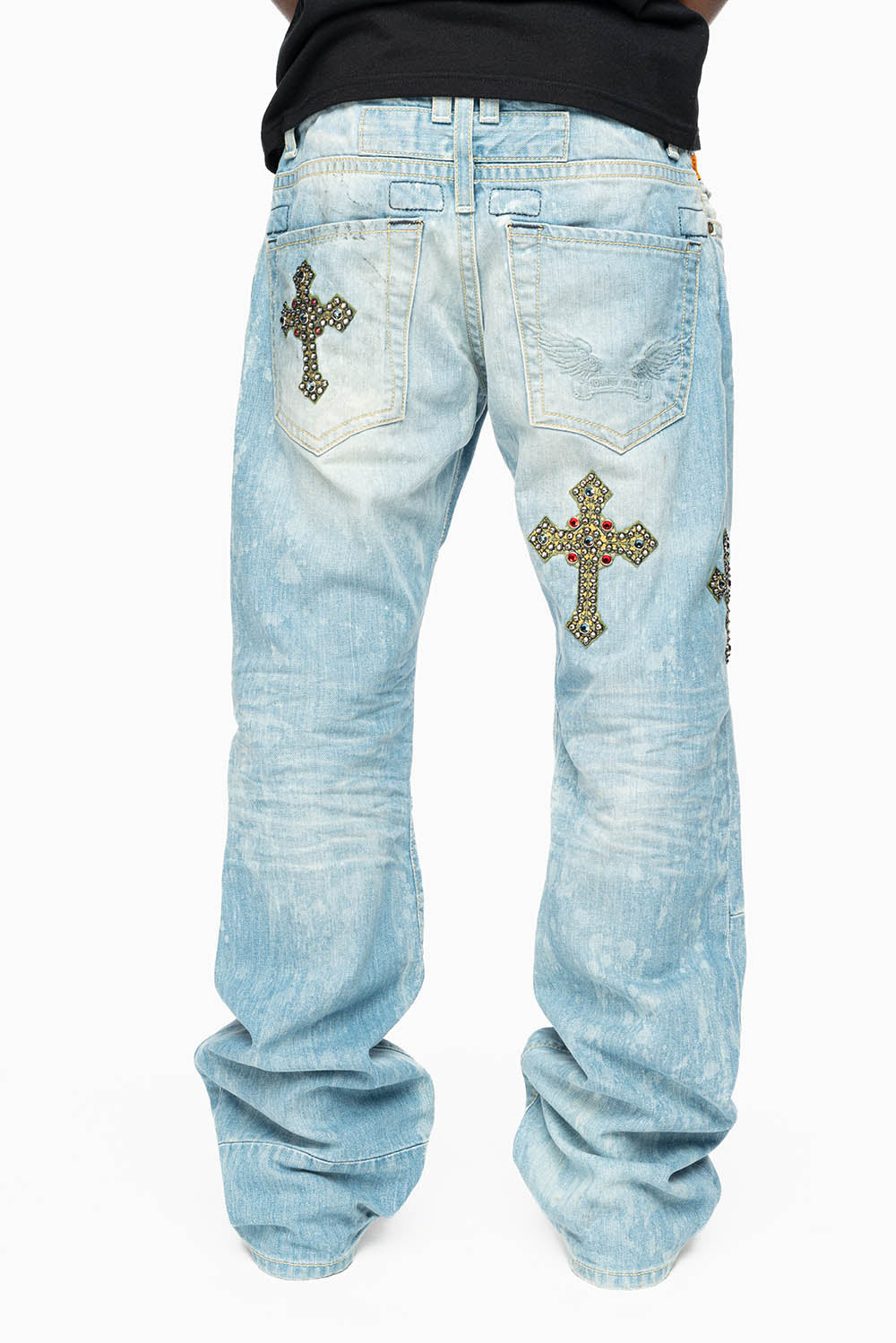 ROBIN’S BOOT CUT JEAN IN 5D LIGHT WASH EMBELLISHED WITH MULTIPLE CROSS PATCHES AND CRYSTALS ALL OVER