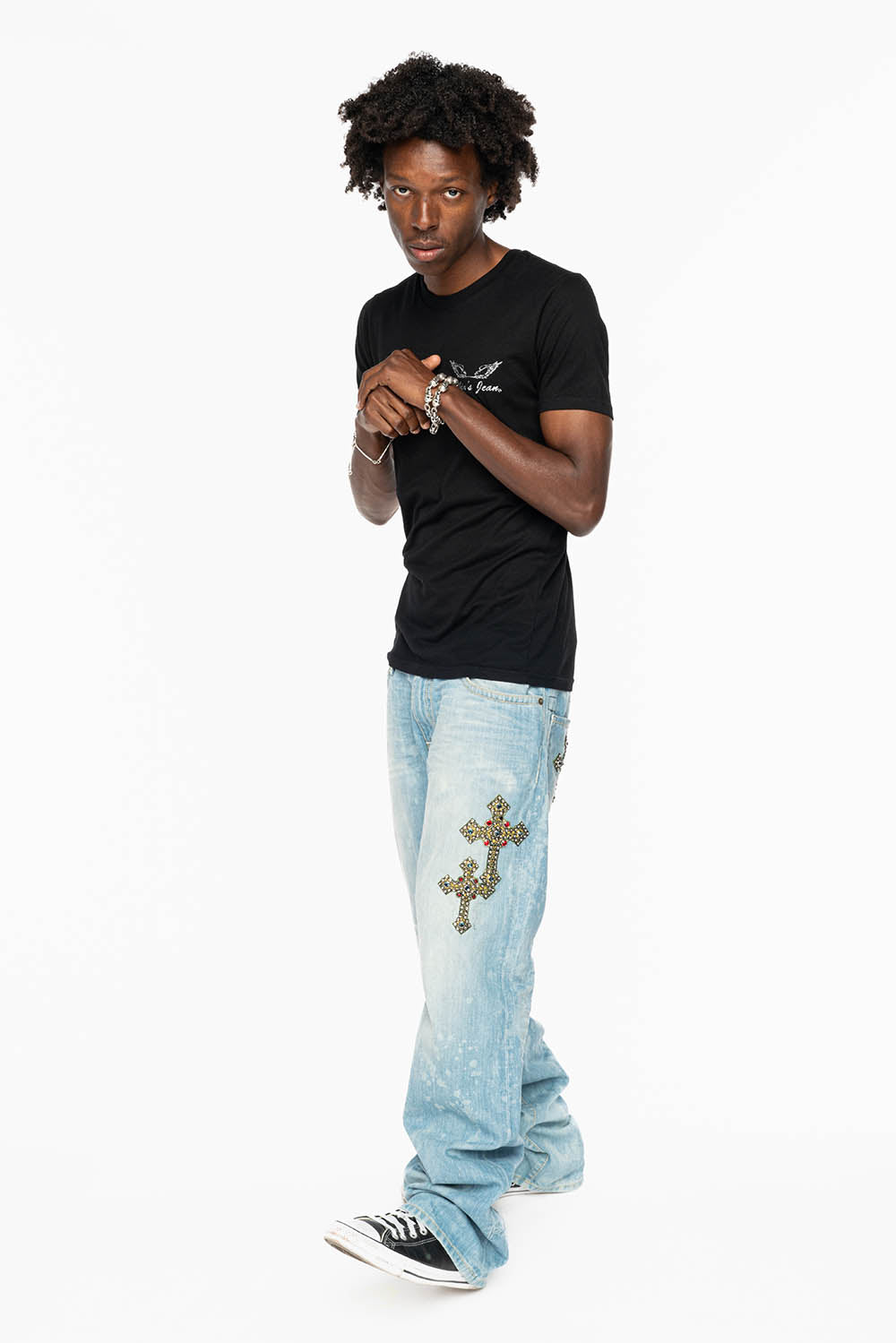 ROBIN’S BOOT CUT JEAN IN 5D LIGHT WASH EMBELLISHED WITH MULTIPLE CROSS PATCHES AND CRYSTALS ALL OVER