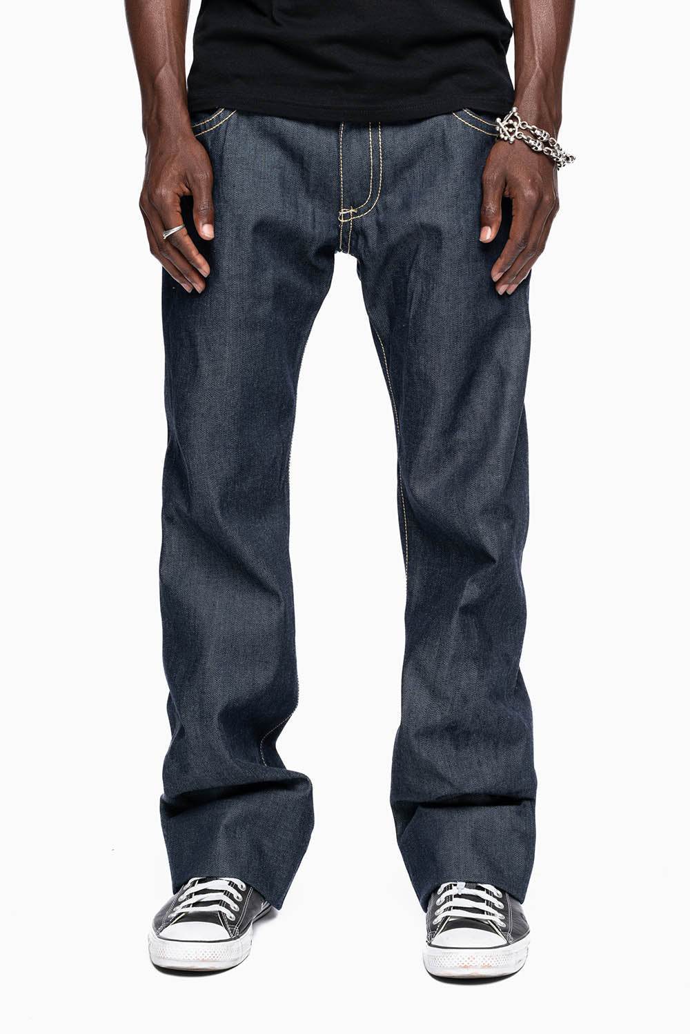 ROBIN’S BOOT CUT GOTHIC JEAN  IN RAW DENIM WITH BLK LEATHER  GOTHIC CROSS FULLY  EMBELLISHED WITH CRYSTALS