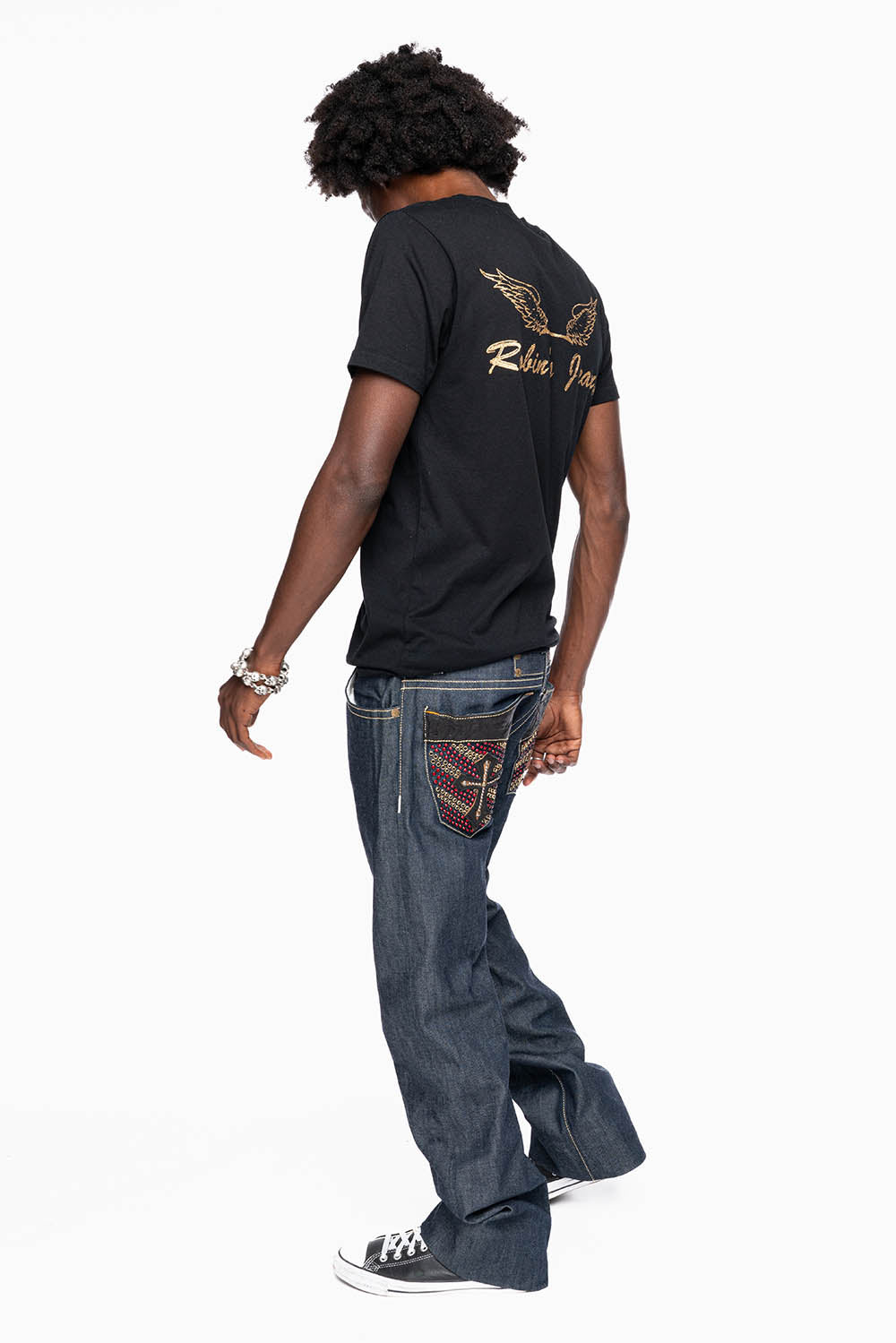 ROBIN’S BOOT CUT GOTHIC JEAN  IN RAW DENIM WITH BLK LEATHER  GOTHIC CROSS FULLY  EMBELLISHED WITH CRYSTALS