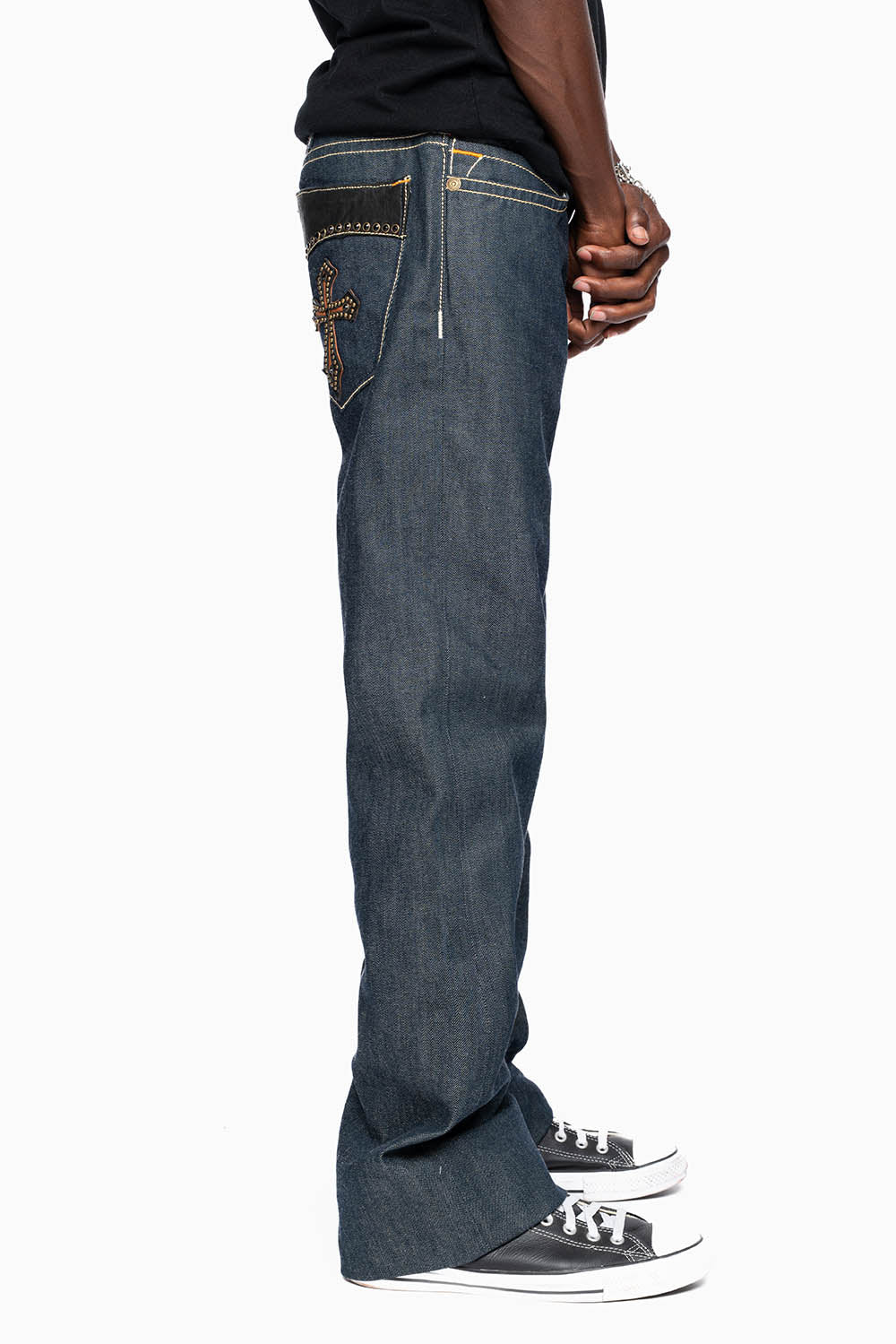 ROBIN’S BOOT CUT GOTHIC JEAN  IN RAW DENIM WITH BLK LEATHER  GOTHIC CROSS  EMBELLISHED WITH JET BLK CRYSTALS