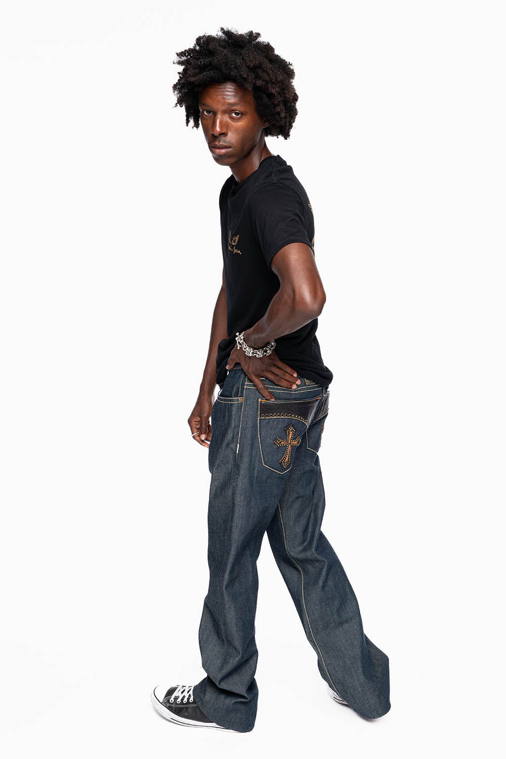 ROBIN’S BOOT CUT GOTHIC JEAN  IN RAW DENIM WITH BLK LEATHER  GOTHIC CROSS  EMBELLISHED WITH JET BLK CRYSTALS