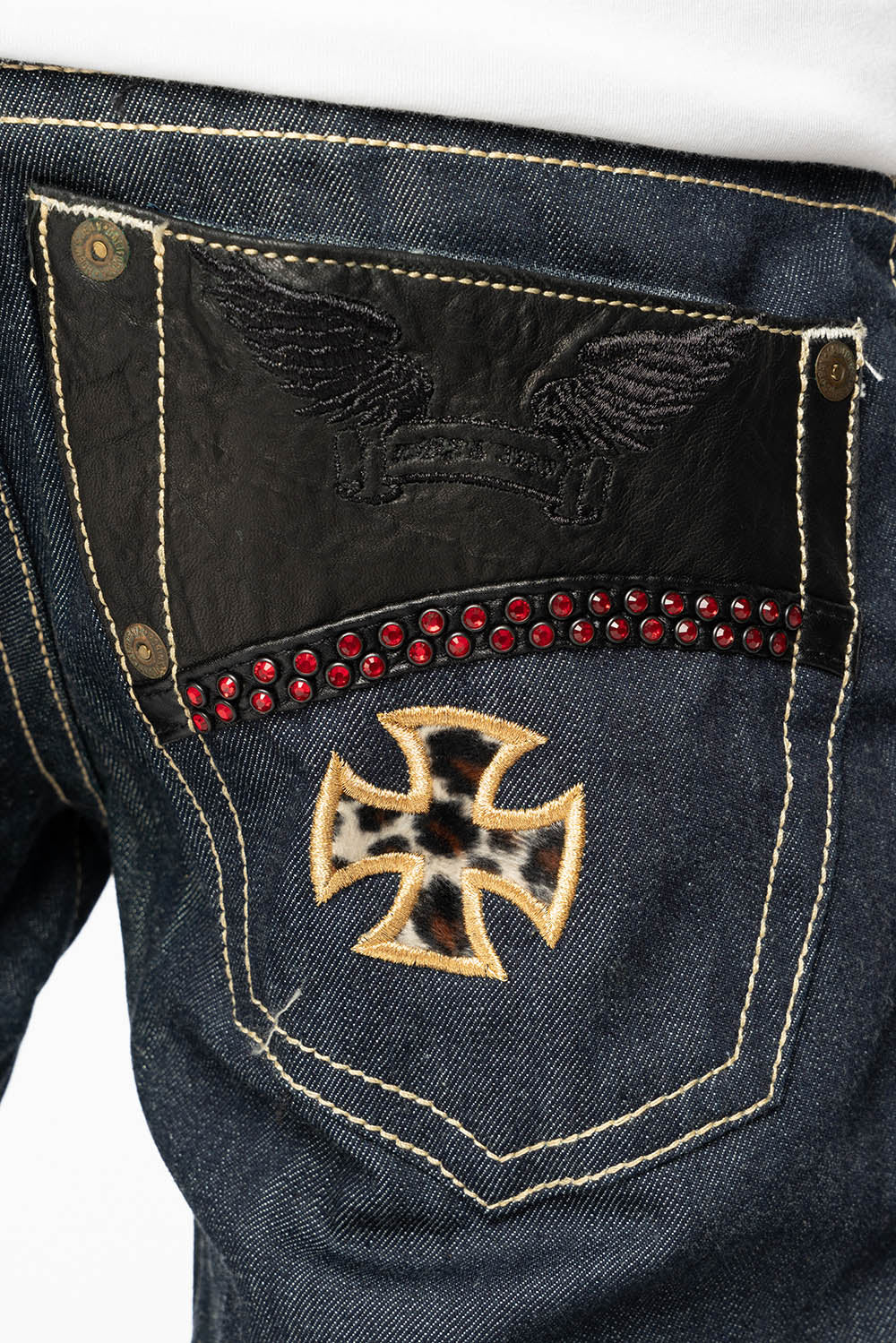 BONNEVILLE  JEAN W/BLK LEATHER IN RAW DENIM WITH CROSS AND EMBELLISHED WITH RED CRYSTALS