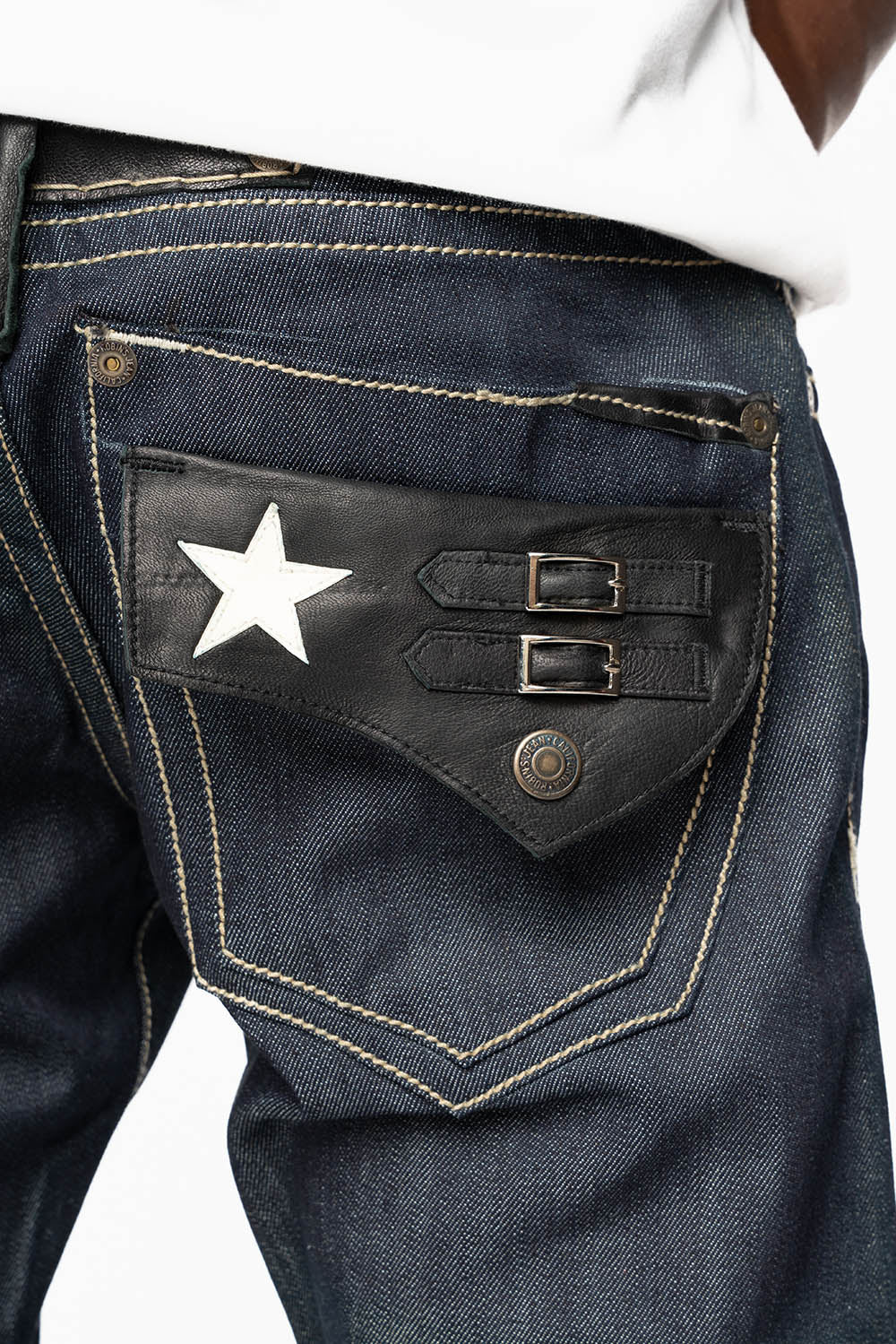TOBACCO JEAN W/BLK LEATHER FLAP & ZIPPERS IN RAW DENIM
