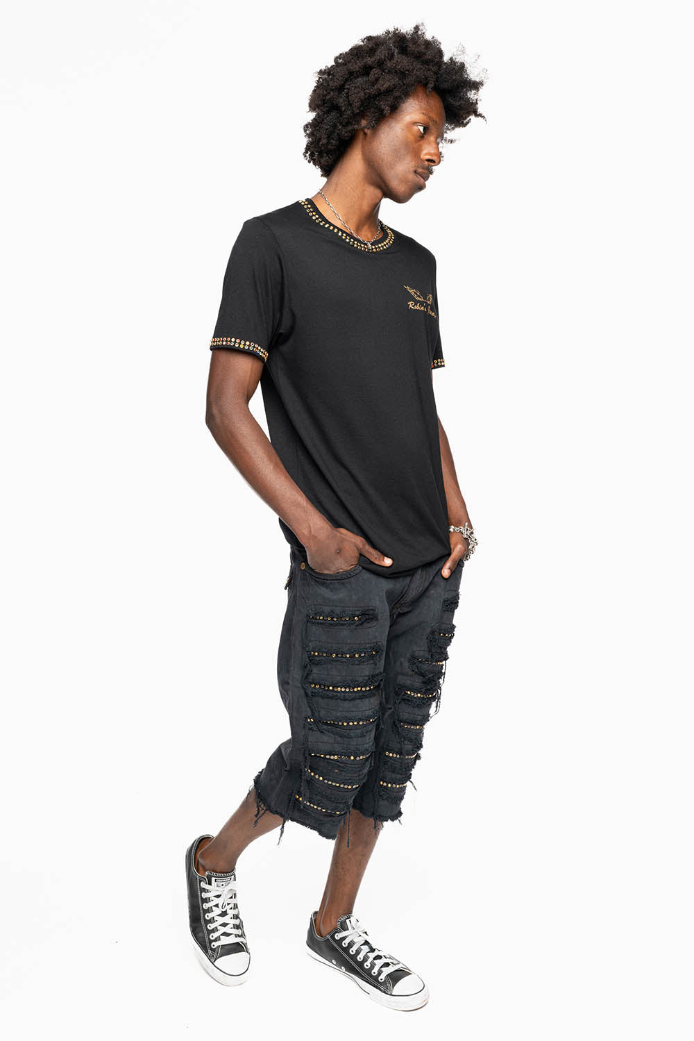 MENS DESTROYED SHORTS WITH KILLER FLAP POCKET IN BLACK EMBELLISHED WITH GOLD CRYSTALS AND GUNMETAL STUDS