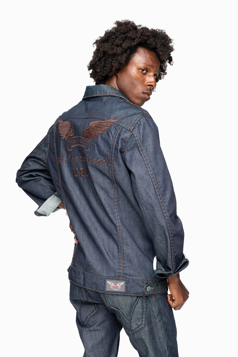 MEN’S CLASSIC RAW  DENIM  JEAN JKT WITH HEAVY BROWN CONTRAST STITCHING AND ROBIN’S WING LOGO EMBROIDERY