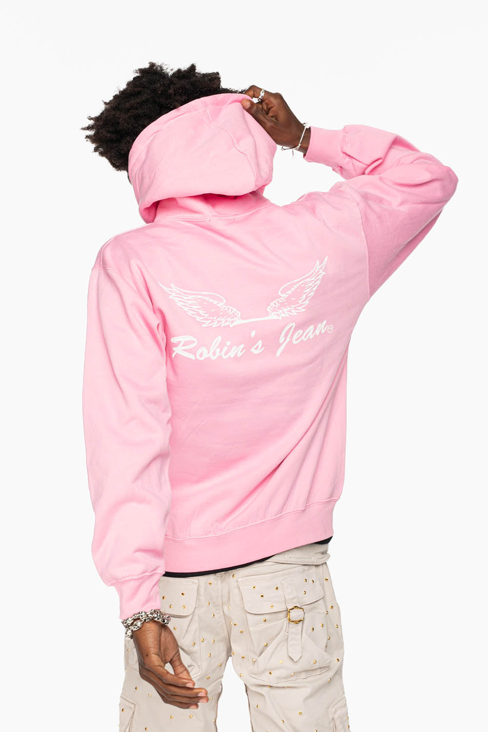 ROBIN’S JEAN PULLOVER HOODIE IN LIGHT PINK WITH  WHITE WING PRINT