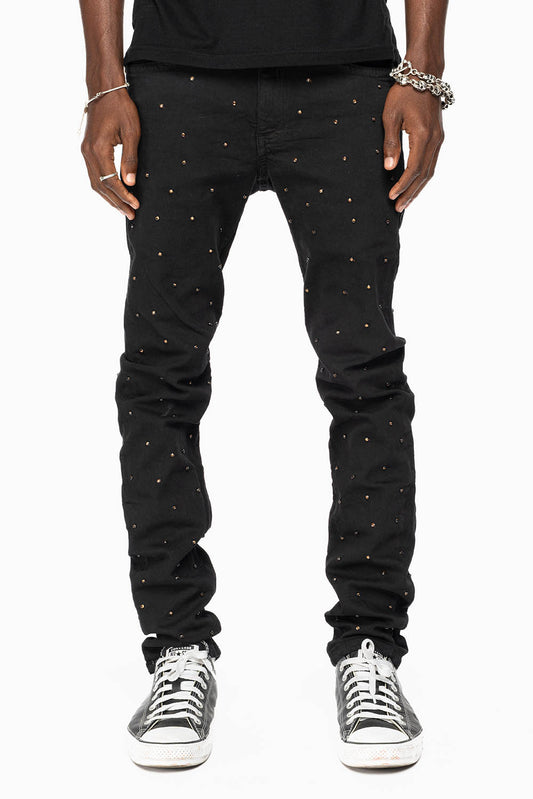 SKINNY JEAN IN PURE BLACK WITH GOLD O.E. LOGO EMBELLISHED ALLOVER WITH SMOKY TOPAZ CRYSTALS