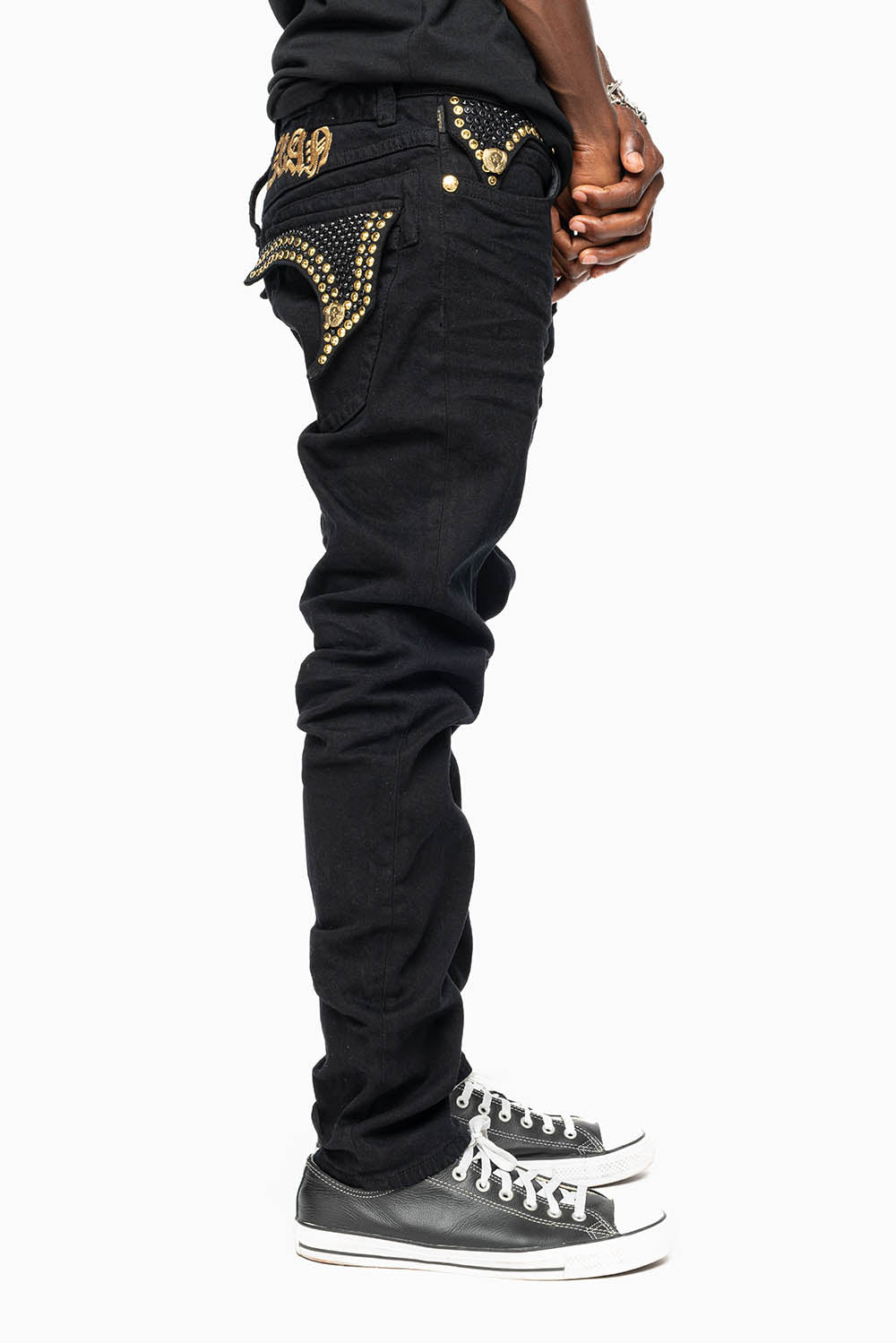 KILLER FLAP SKINNY JEANS FULLY EMBELLISHED WITH  AURUM AND BLK CRYSTALS IN PURE BLACK WITH  GOLD GOTHIC EMBROIDERY