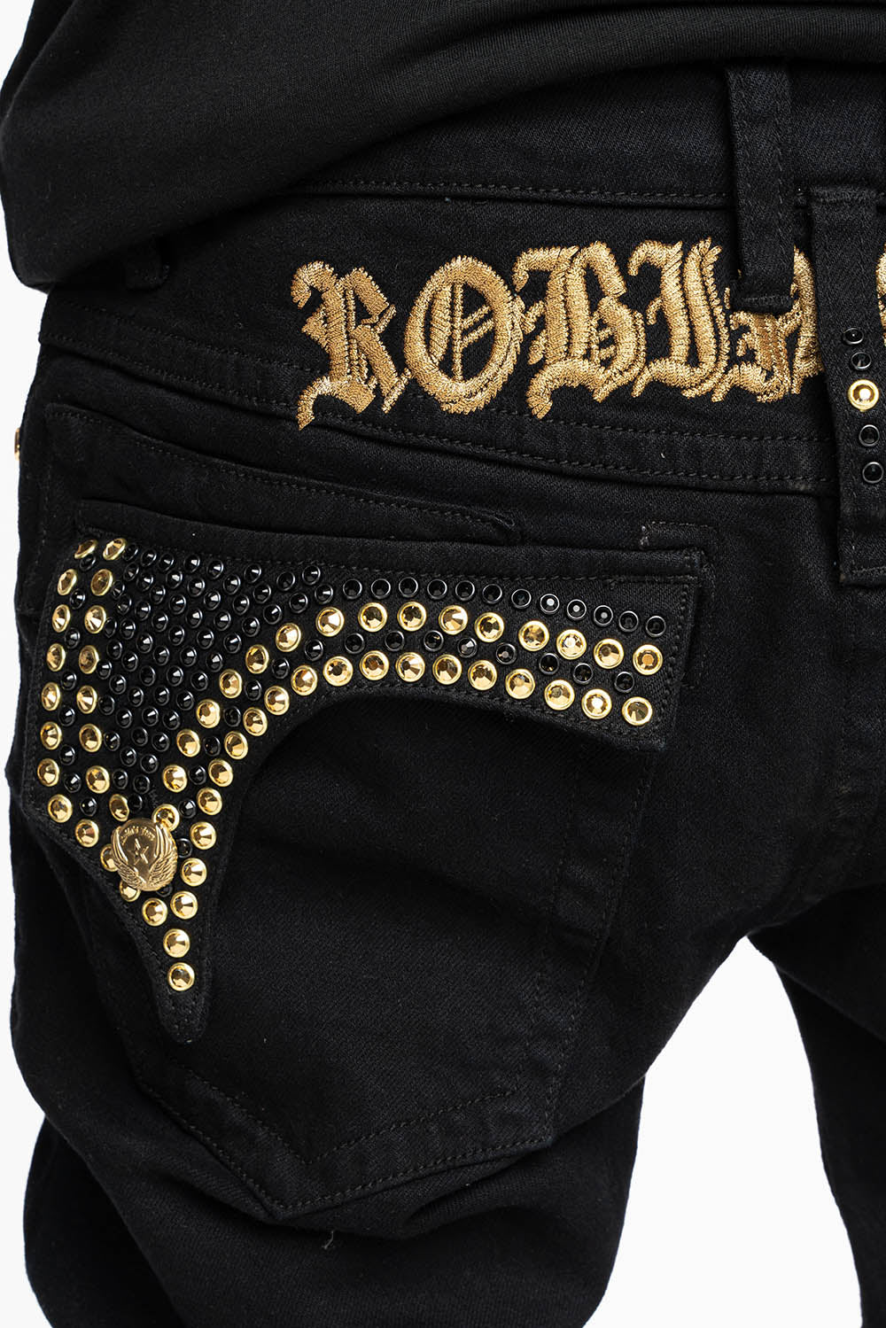 KILLER FLAP SKINNY JEANS FULLY EMBELLISHED WITH  AURUM AND BLK CRYSTALS IN PURE BLACK WITH  GOLD GOTHIC EMBROIDERY