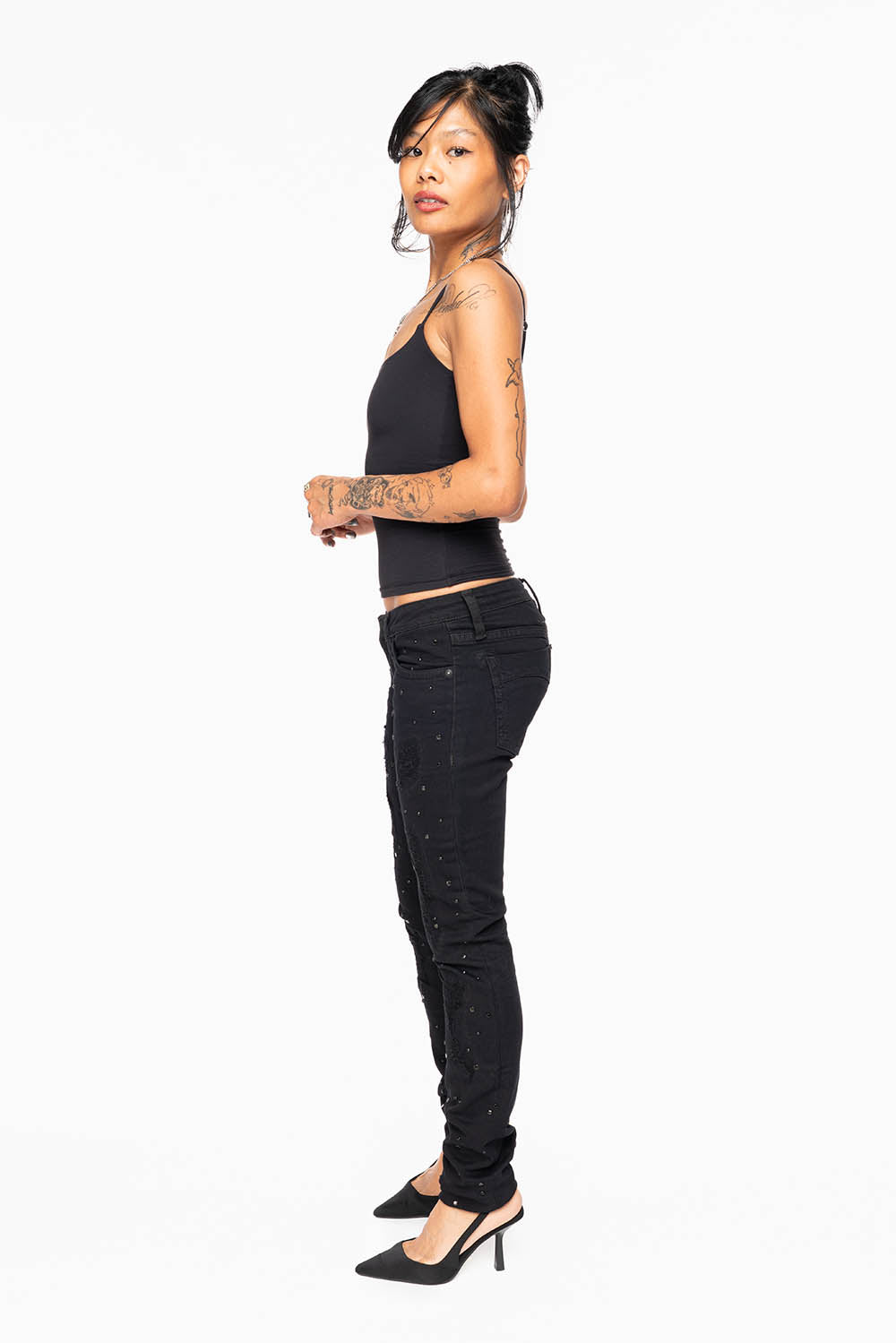 MARILYN WOMENS SKINNY JEANS IN REPAIRED PURE BLACK  WITH TONAL WINGS EMBELLISHED WITH CRYSTALS & STUDS