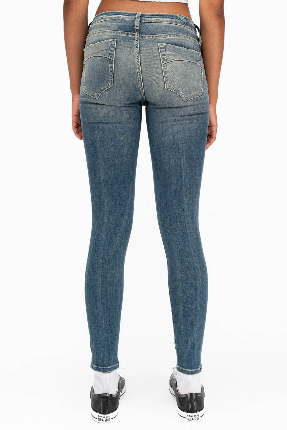 MIDRISE WOMENS SKINNY JEANS IN RIPPED BLUE WASH