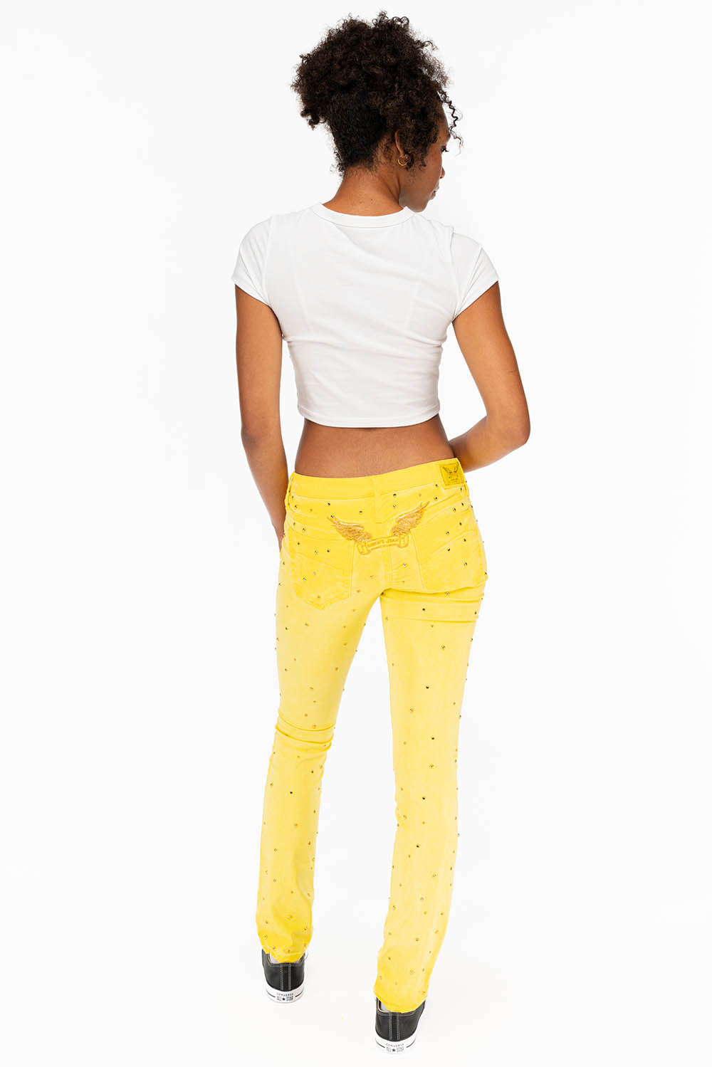 MARILYN LOW RISE WOMENS STUDDED STRAIGHT LOW RISE JEANS IN OIL YELLOW WITH TONAL WINGS AND CRYSTALS