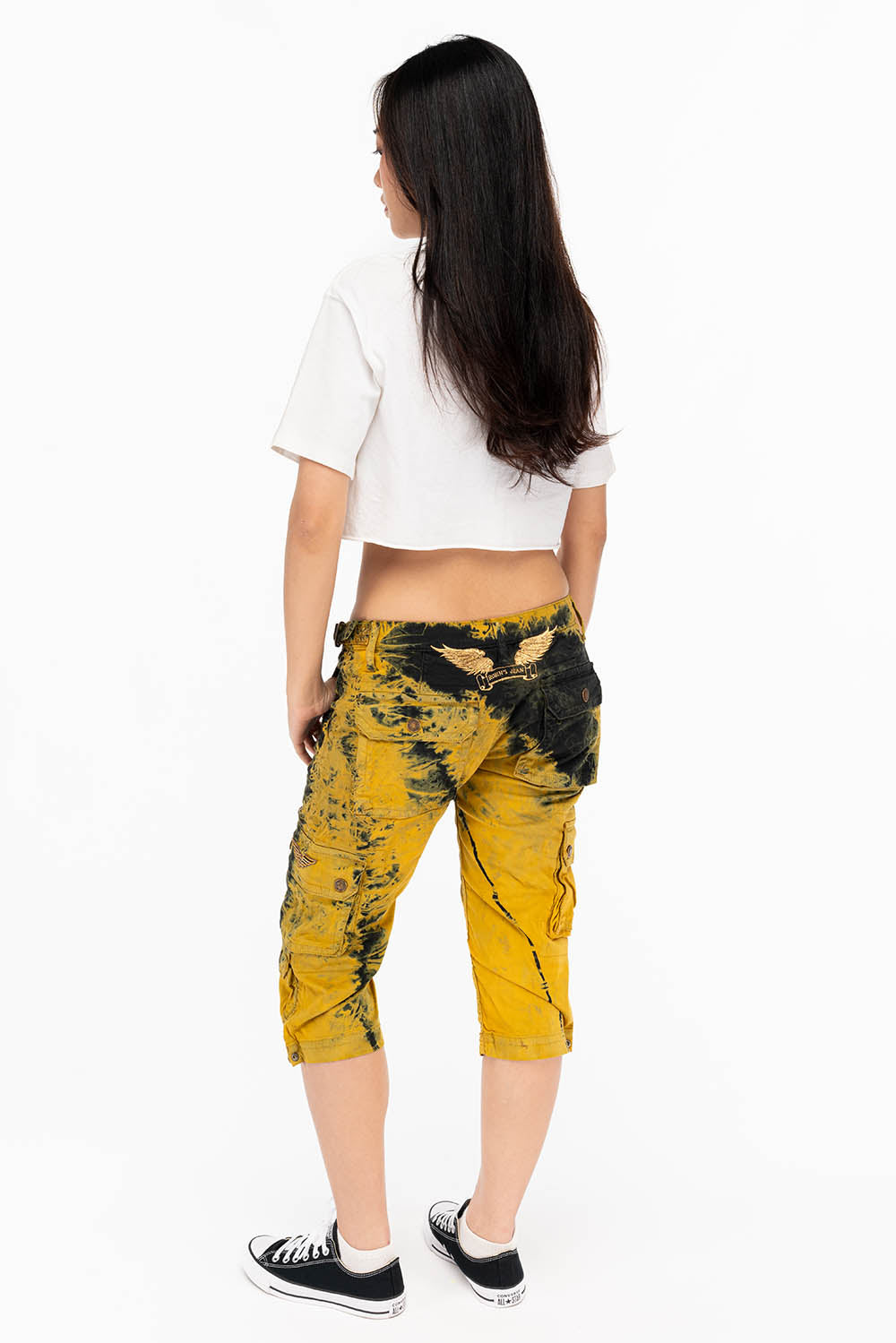 MILITARY STYLE ASSORTED PATCH WOMENS CARGO SHORTS IN TYE DYE YELLOW AND BLACK WASH